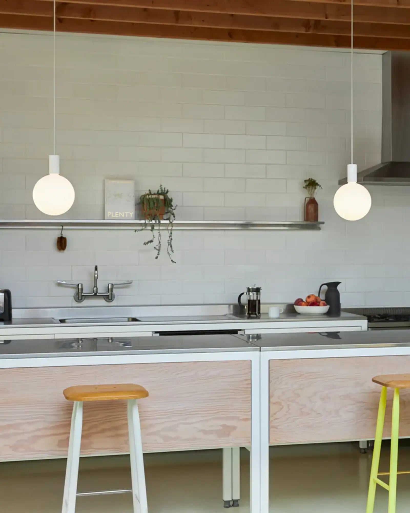 Alumina Single Pendant Light by Tala featured within an industrial kitchen | Nook Collections