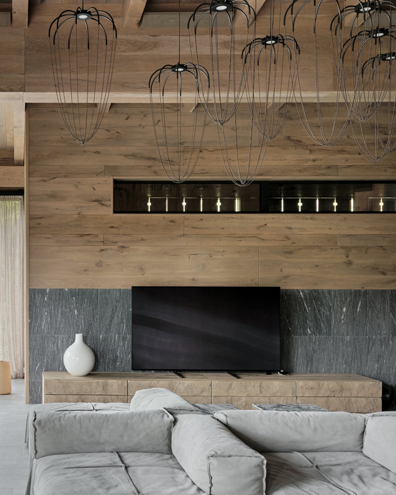 Alysoid Pendant Light by Axolight featured in a modern contemporary living room | Nook Collections