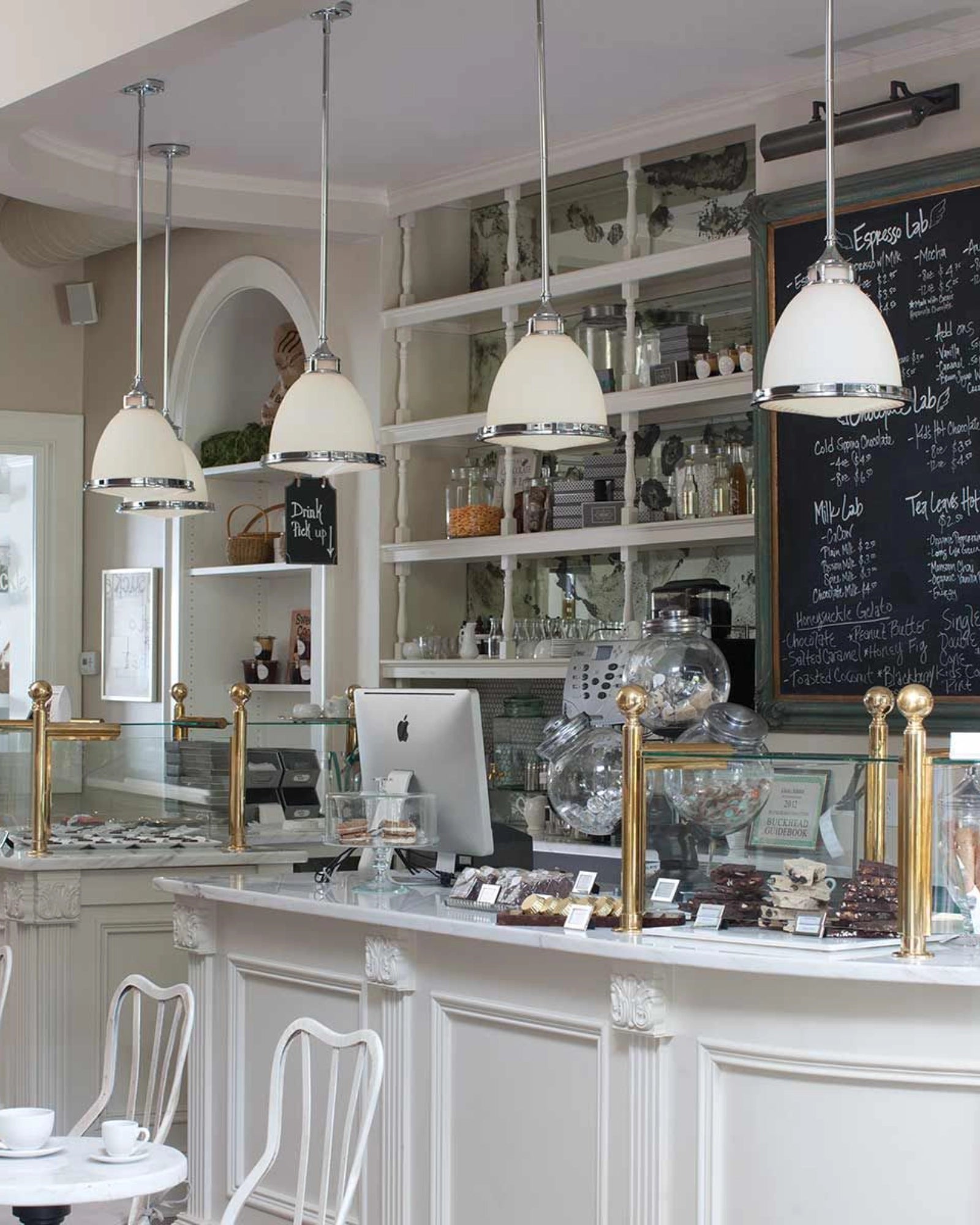 Amalia Pendant Light by Elstead featured in a traditional cafe | Nook Collections