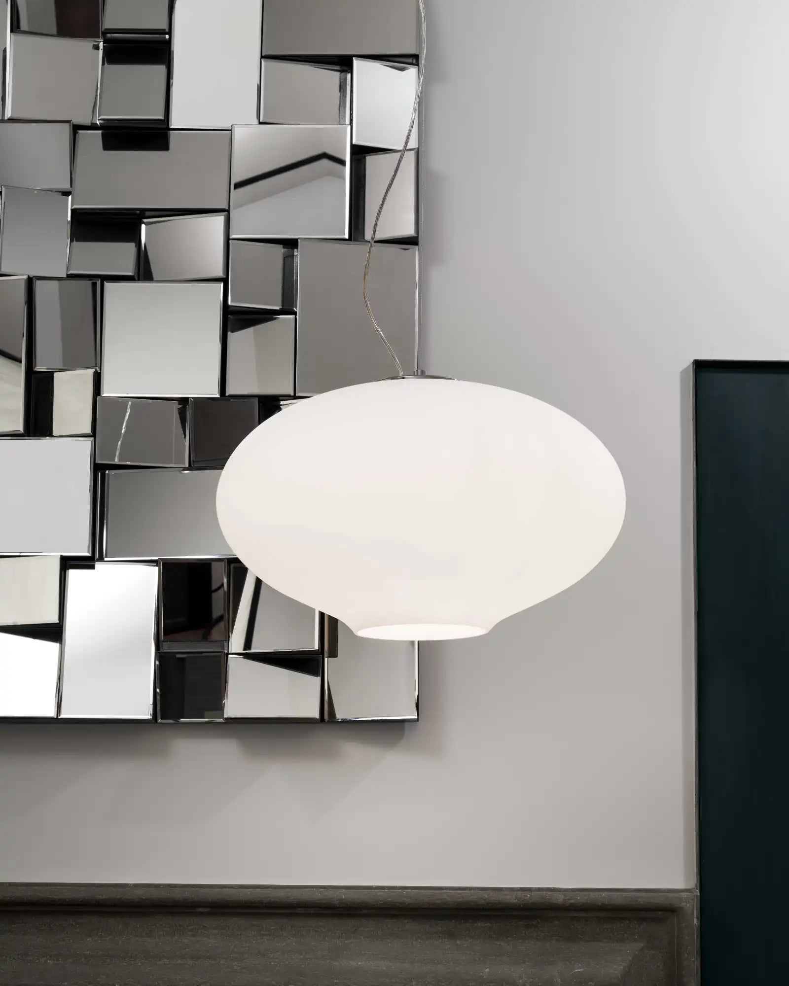 Anita Pendant Light by Nemo Lighting featured in a modern contemporary living room | Nook Collections