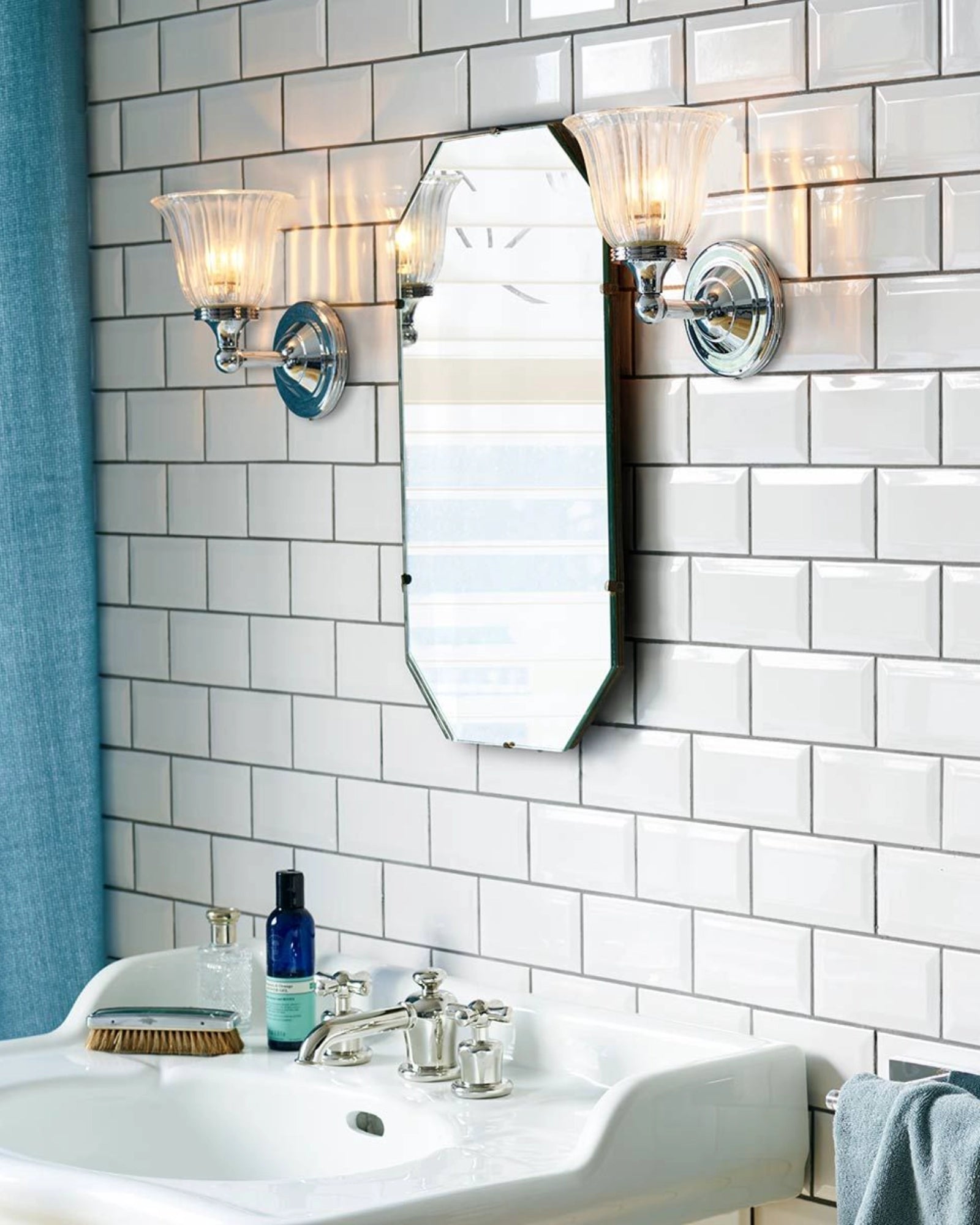 Austen 1 Wall Light by Elstead featured in a traditional bathroom | Nook Collections