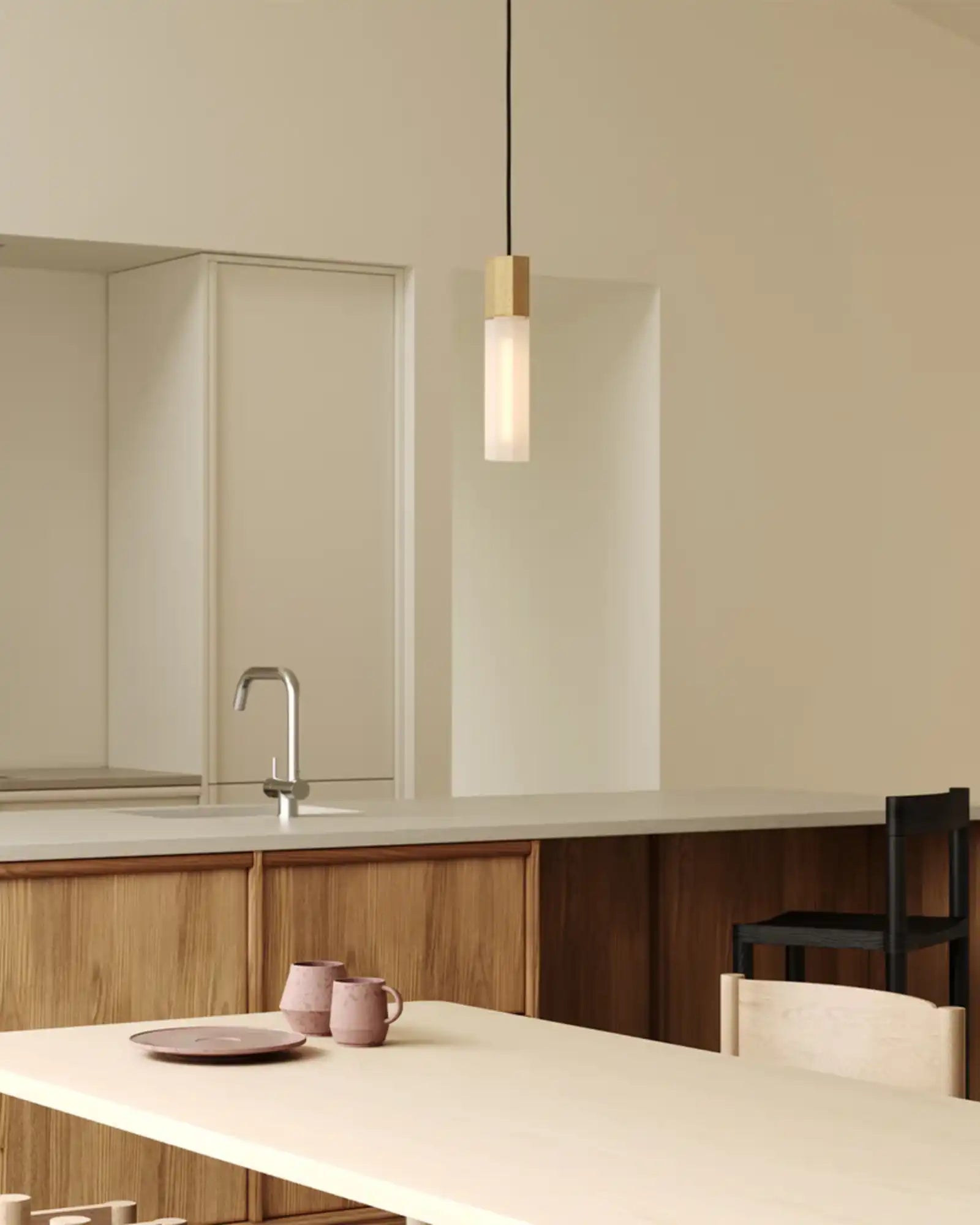 Basalt Pendant Light by Tala featured within a minimalist kitchen | Nook Collections