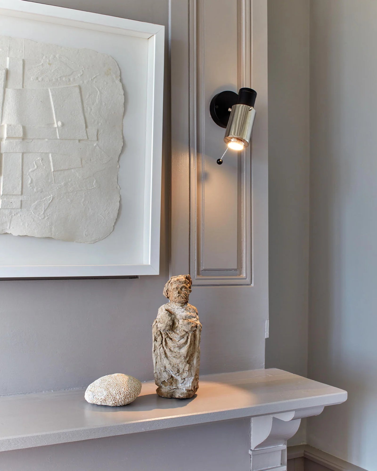 Biny Spot Wall Light by DCW Interiors featured in a modern contemporary living room | Nook Collections