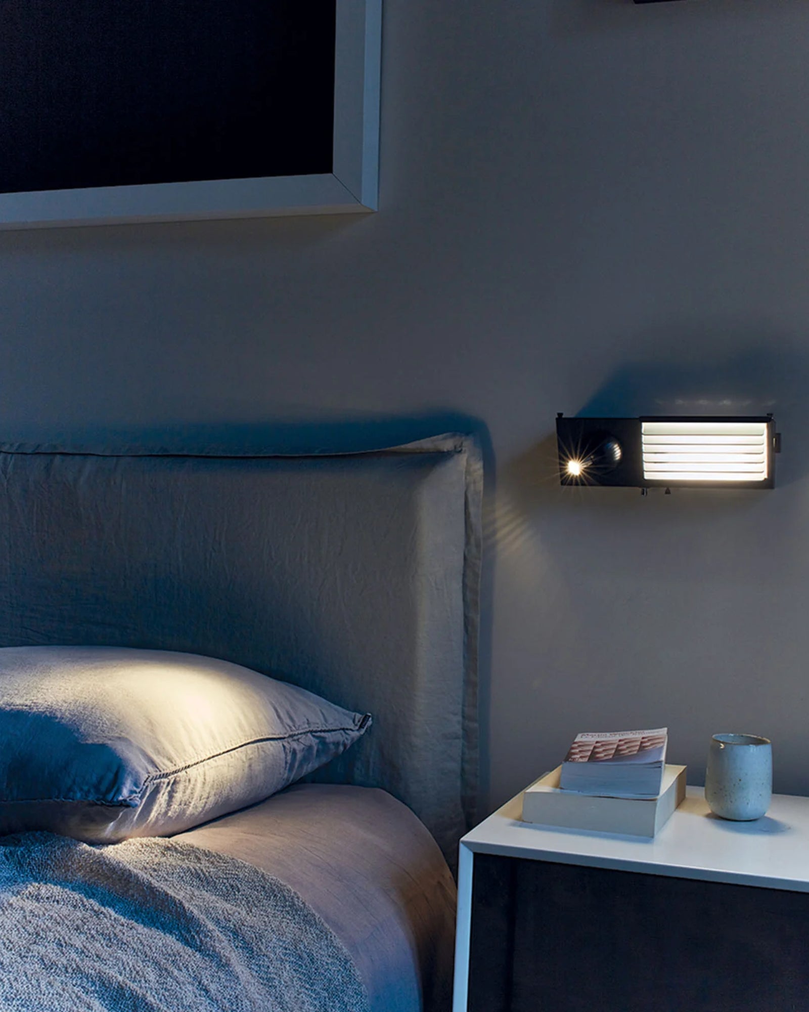 Biny Wall Light by DCW Interiors featured in a modern contemporary bedroom | Nook Collections