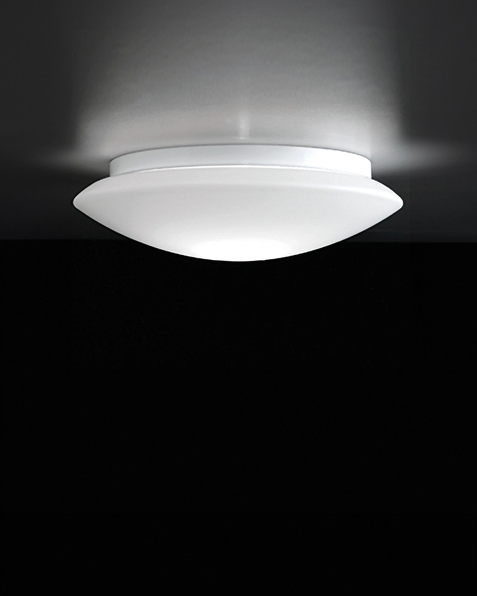 Ceiling light fixture on a black background