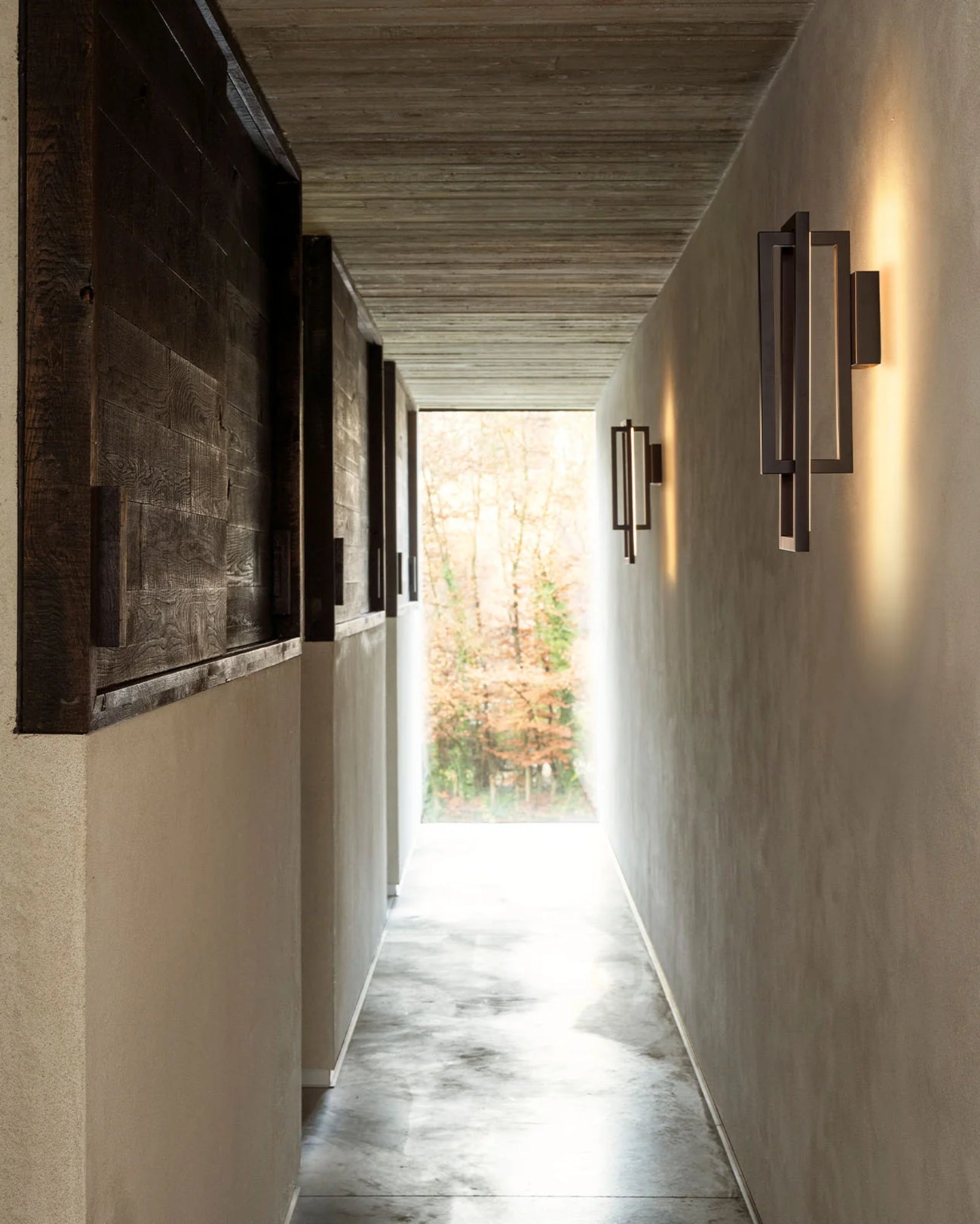 Borely Wall Light by DCW Interiors featured in a contemporary hallway | Nook Collections