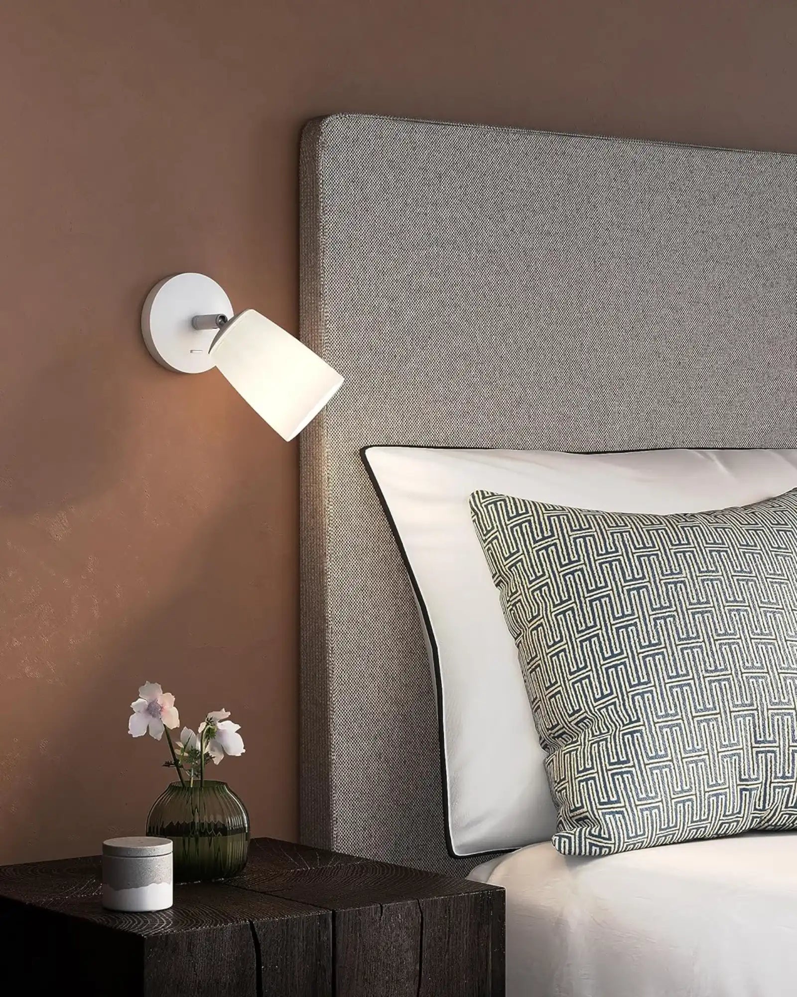 Carlton Wall Light by Astro Lighting featured within a contemporary bedroom | Nook Collections