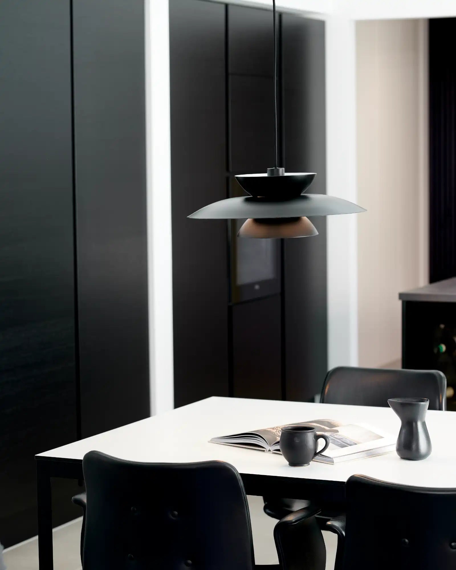 Carmen Pendant Light by Nordlux Lighting featured within a contemporary dining room | Nook Collections