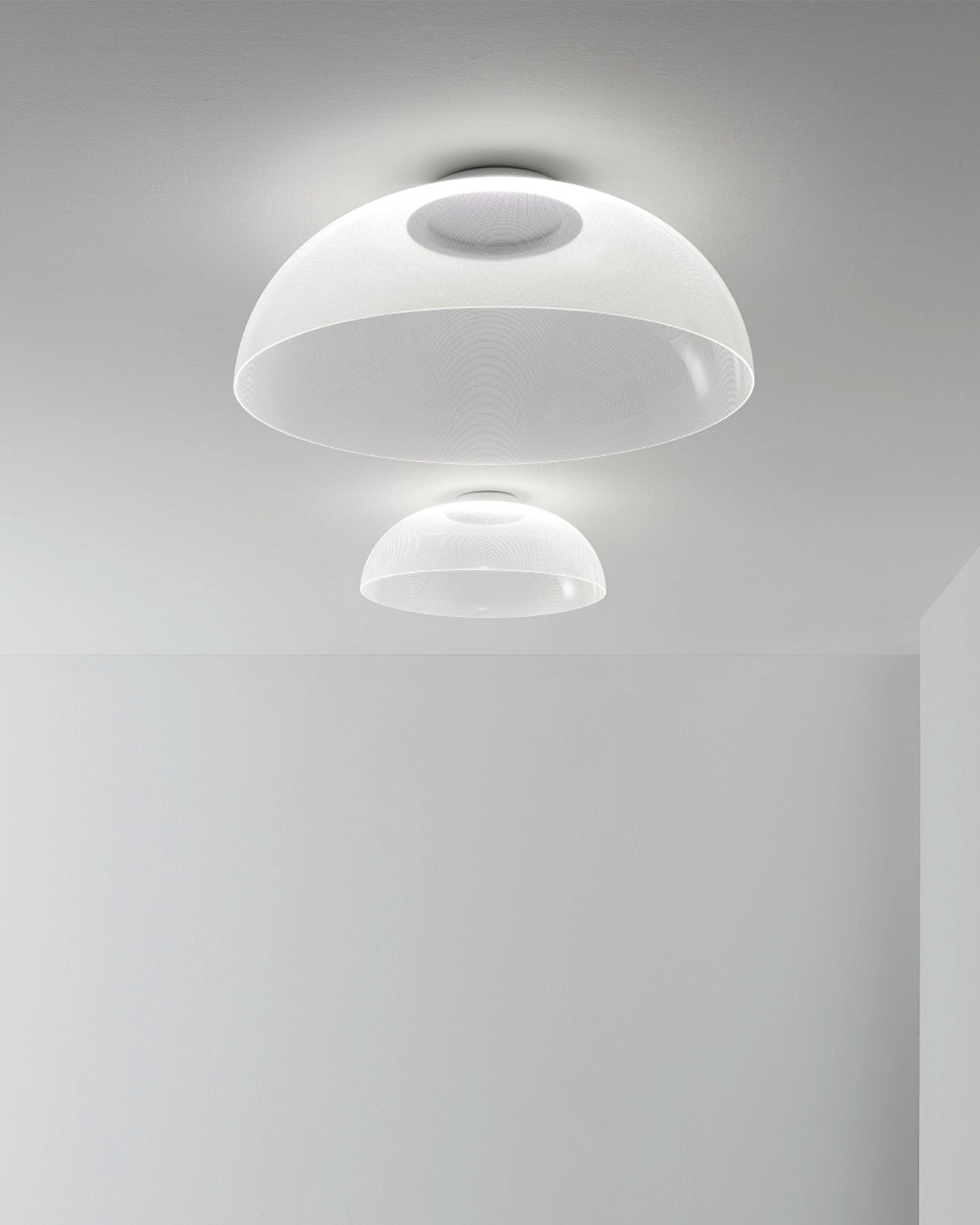 Demi Ceiling Light by Stilnovo, a clear ceiling lamp in two sizes.