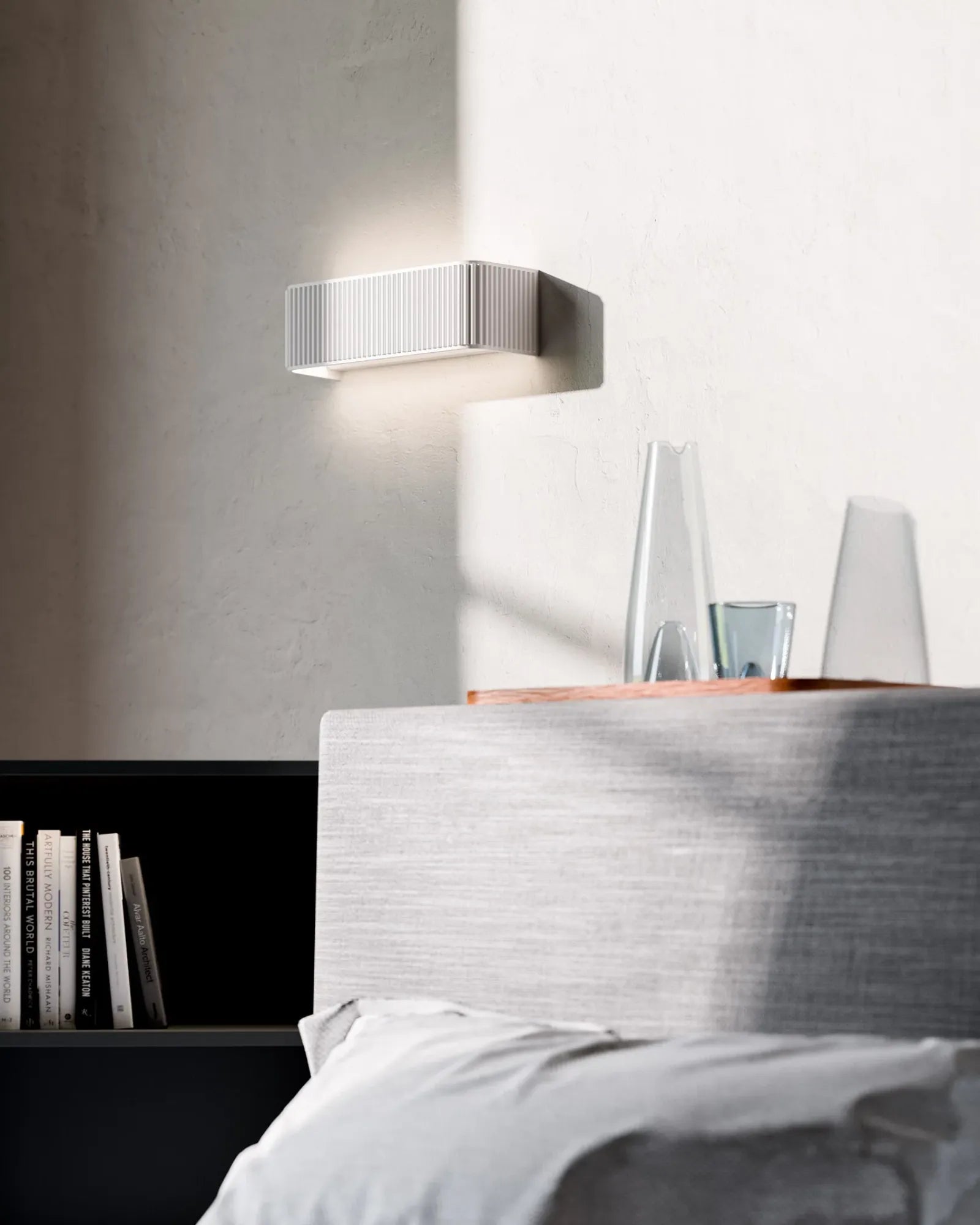 Dresscode Wall Light by Rotaliana featured within a contemporary bedroom | Nook Collections