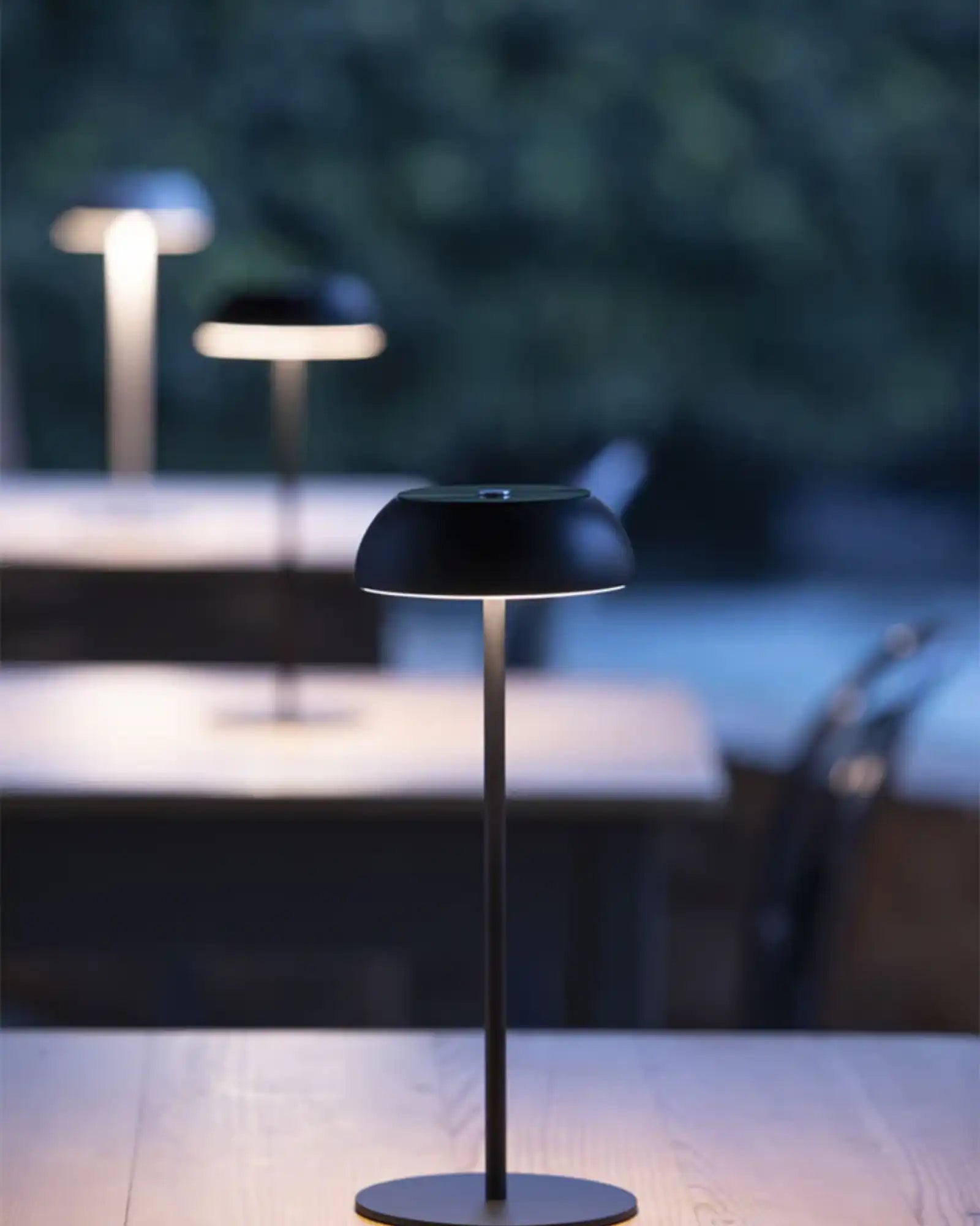 Float Table Lamp by Axolight featured in a modern contemporary restaurant | Nook Collections