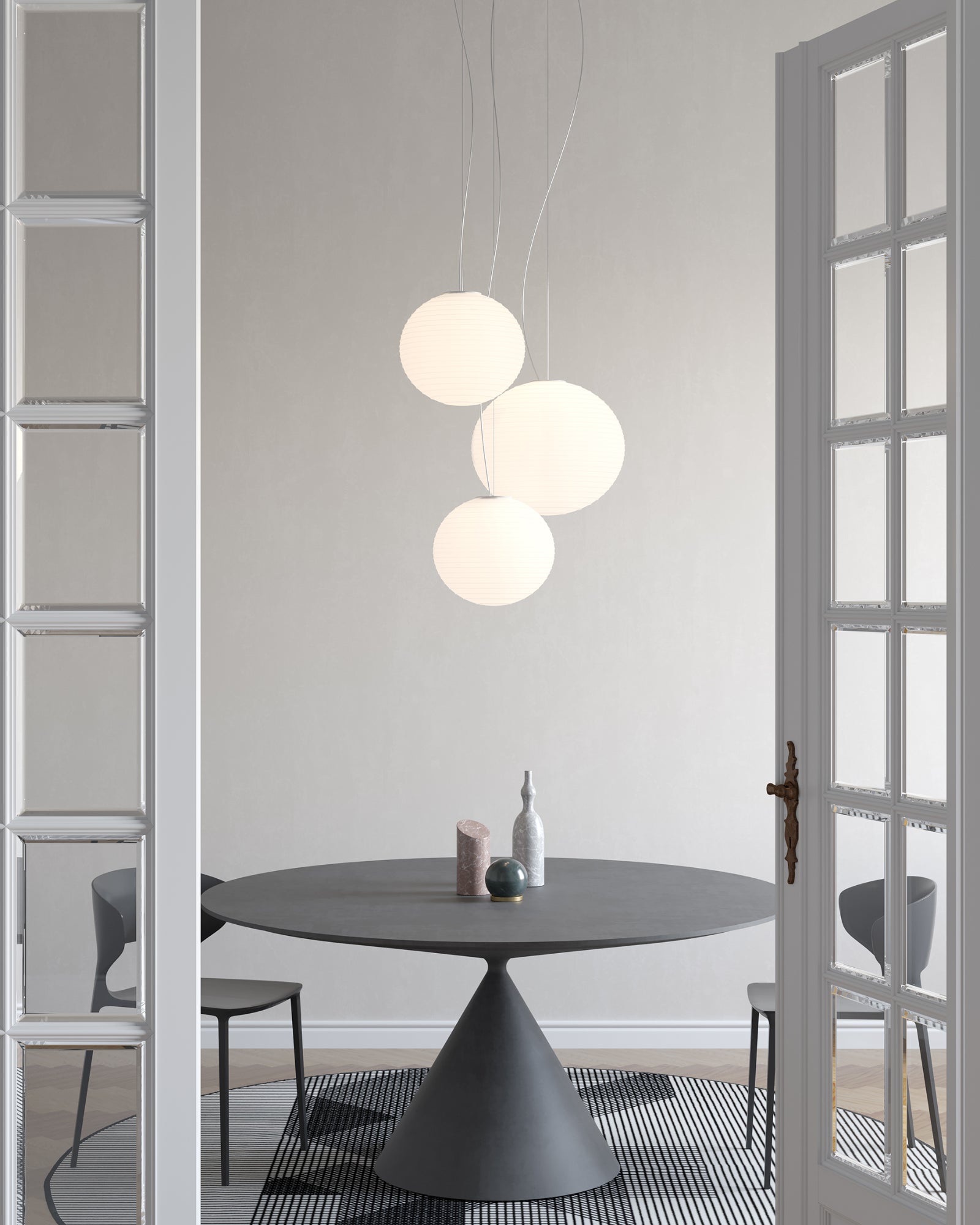 Flow Glass Pendant Light by Rotaliana featured in a modern contemporary dining room | Nook Collections