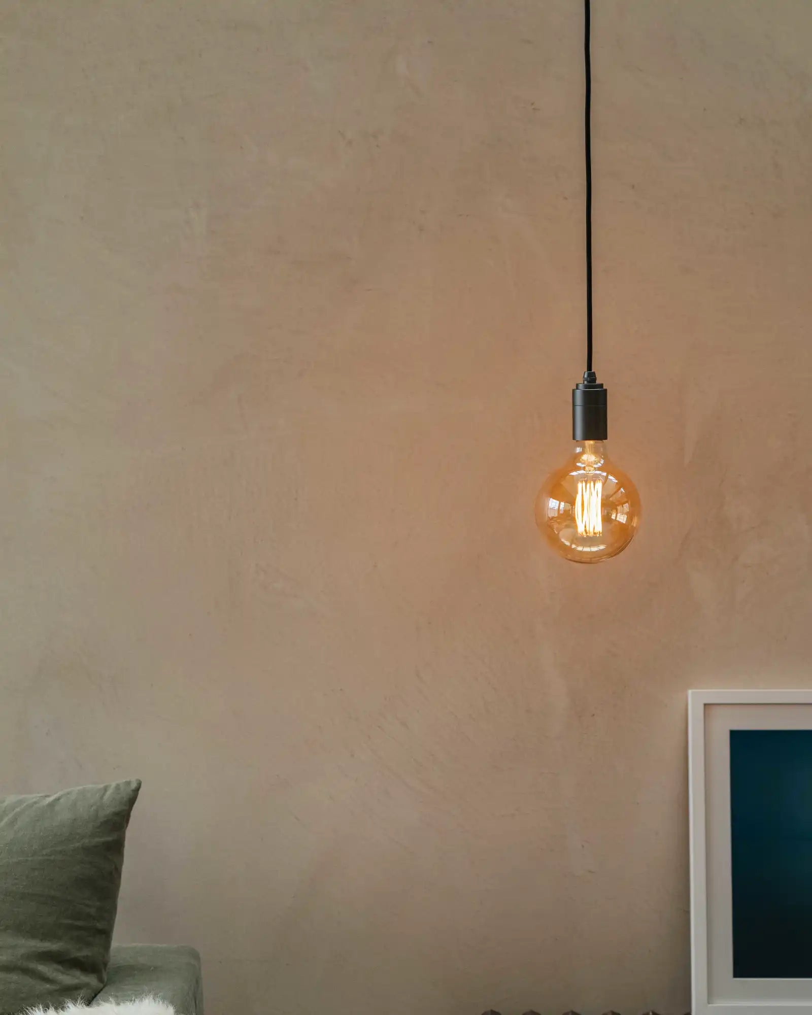 Gaia Plug-in Pendant Light by Tala featured within a contemporary bedroom | Nook Collections