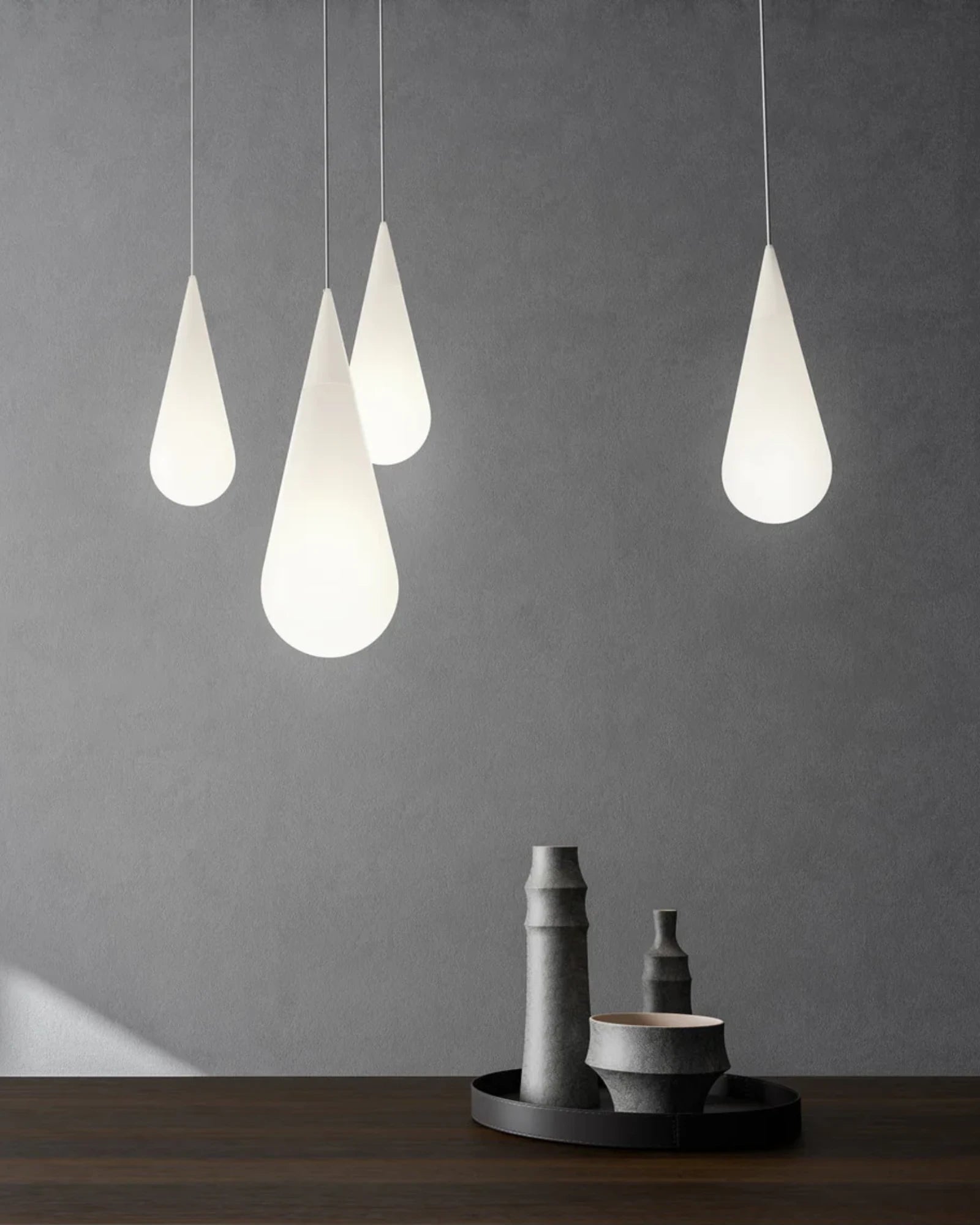 Goccia Pendant Light by Rotaliana featured within a contemporary dining area | Nook Collections