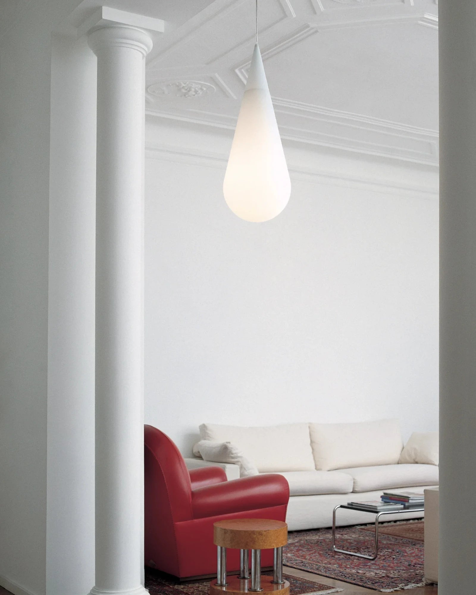 Goccia Pendant Light by Rotaliana featured within a contemporary living room | Nook Collections