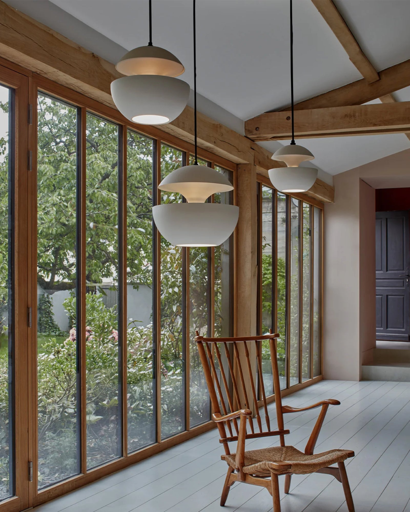 Here Comes The Sun Pendant Light by DCW Interiors featured in a contemporary indoor garden | Nook Collections