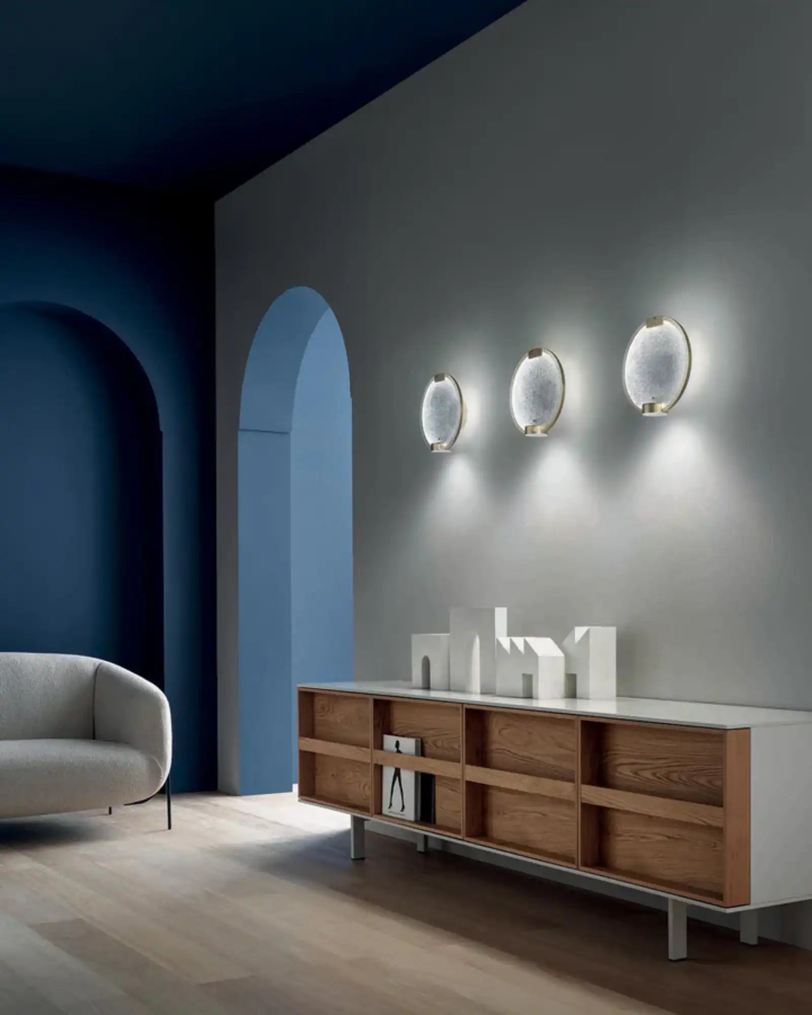 Horo Wall Light by Masiero Lighting featured within a contemporary living room | Nook Collections