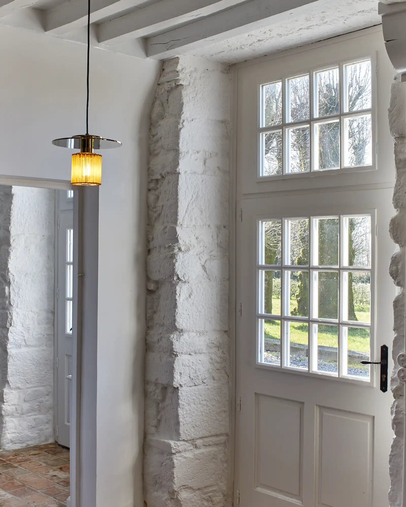 In the Sun Pendant Light by DCW Editions featured within a contemporary kitchen | Nook Collections