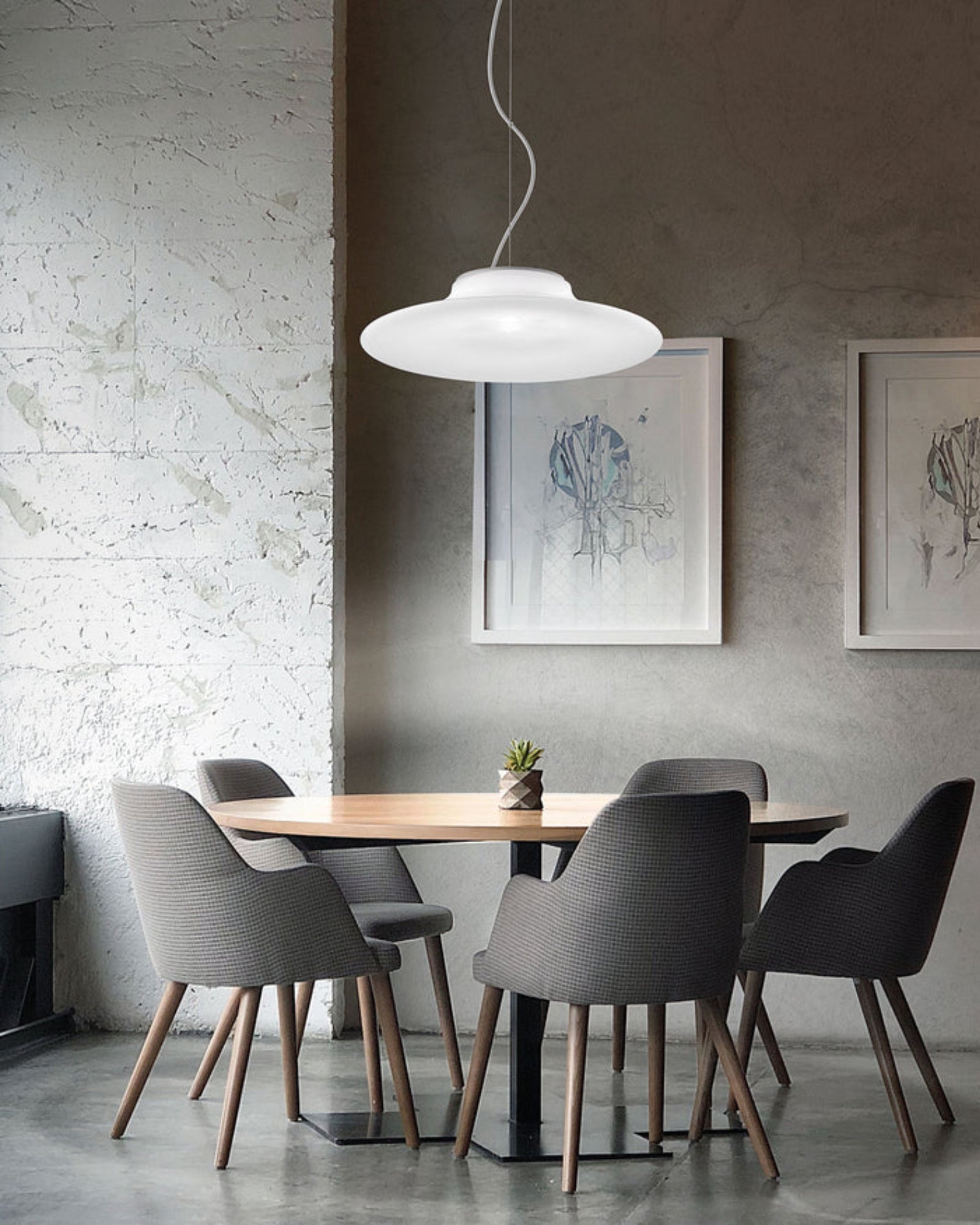 Incanto Pendant Light by Vistosi Lighting featured in a modern contemporary dining room | Nook Collections