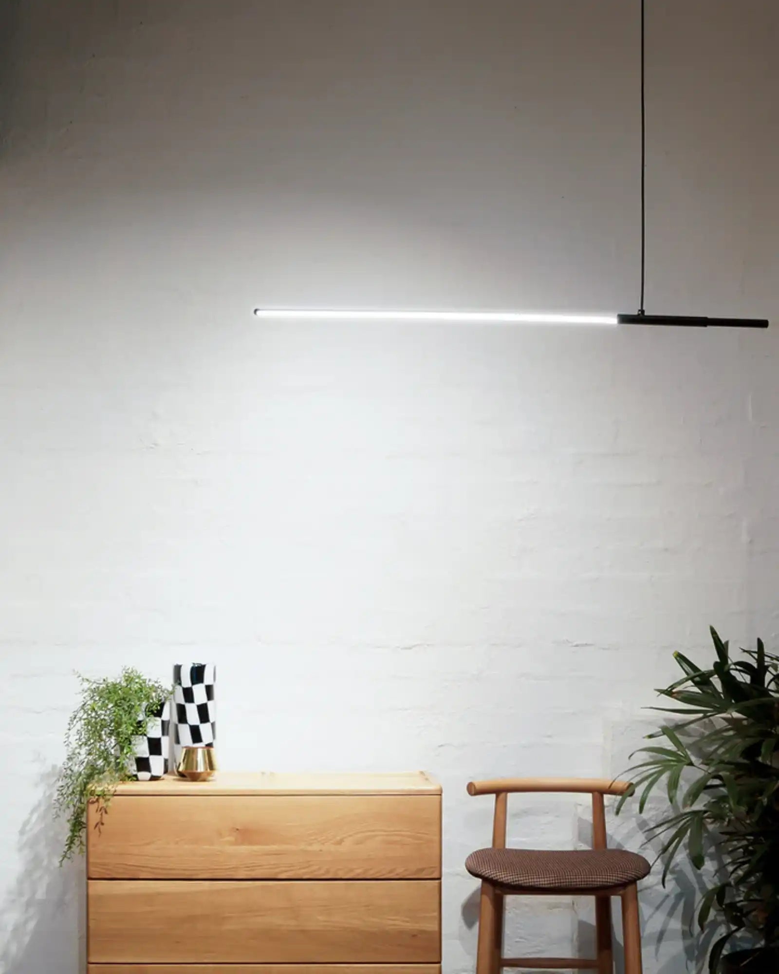 Line Pendant Light by Studio Italia featured in a simple scandinavian kitchen | Nook Collections