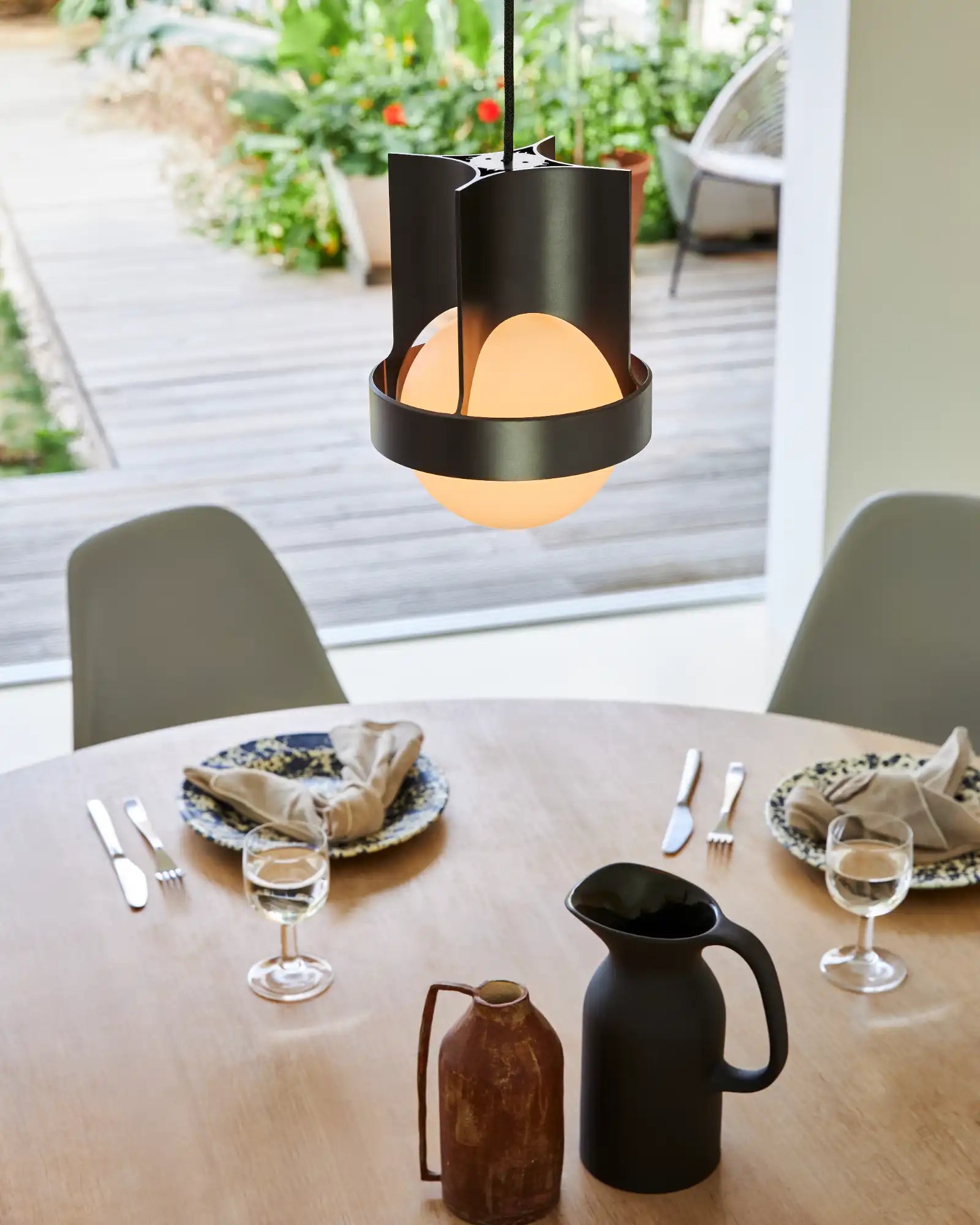 Loop Single Pendant Light by Tala featured within a contemporary dining | Nook Collections