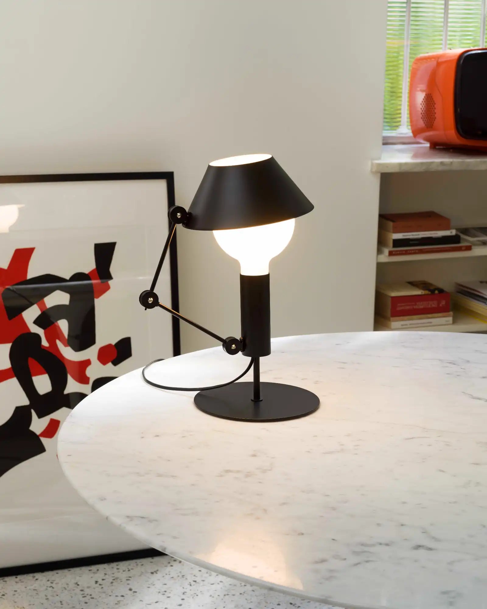 Mr Light Table Lamp by Nemo Lighting featured in a modern contemporary living room | Nook Collections