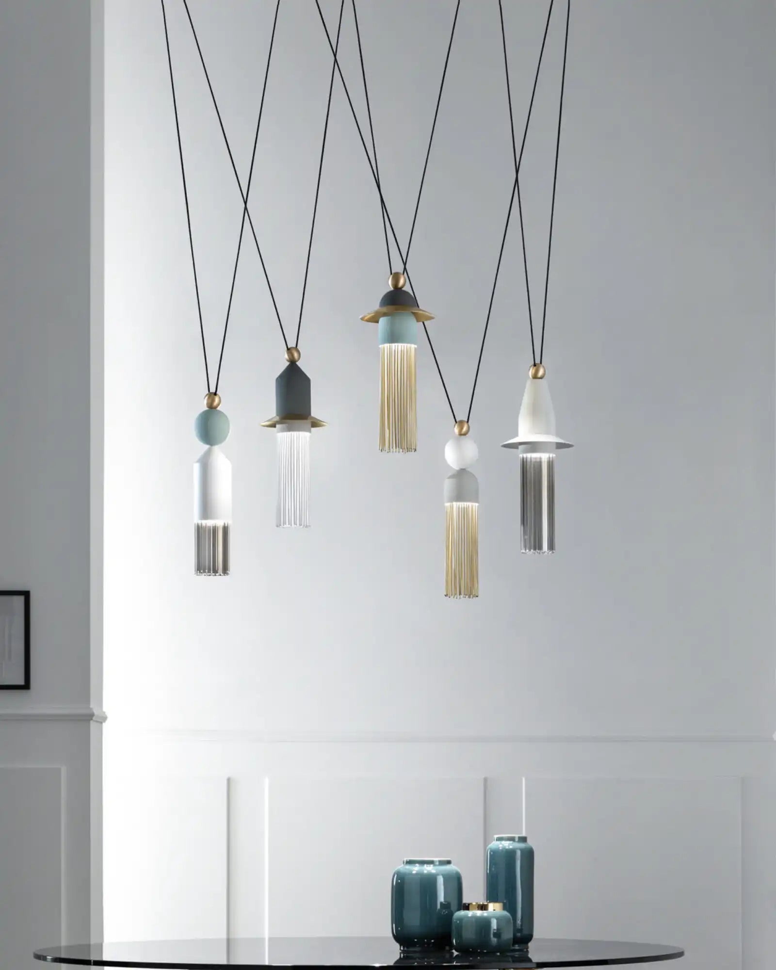 Nappe 5lt Linear Pendant Light by Masiero Lighting featured within a contemporary living room | Nook Collections