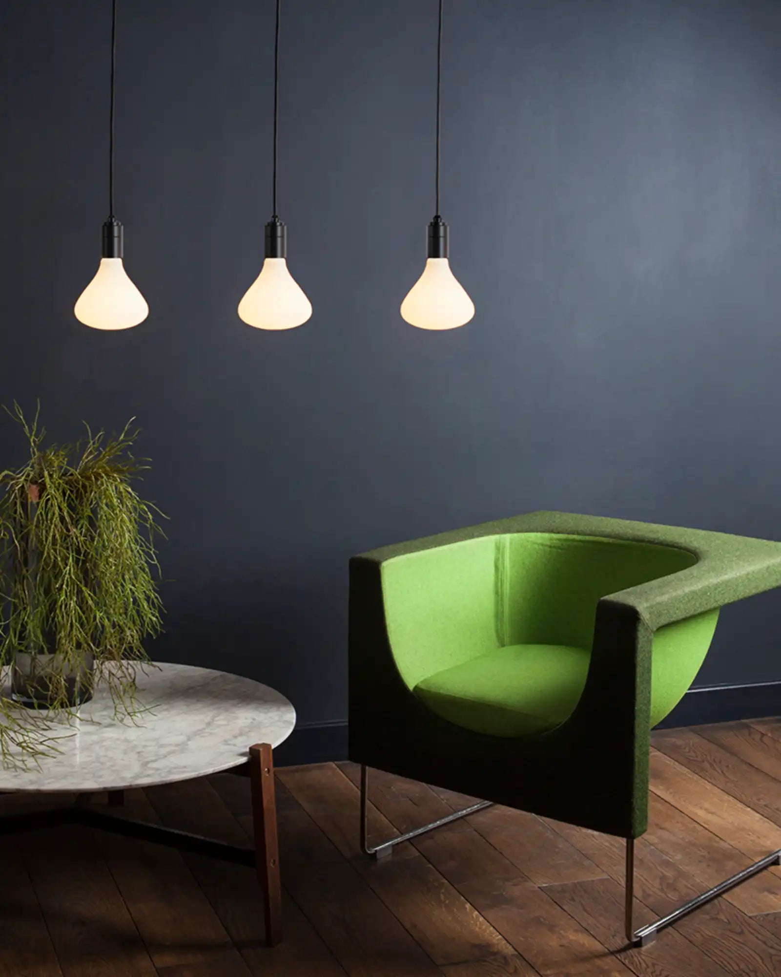 Noma Pendant Light by Tala featured within a contemporary lounge area | Nook Collections