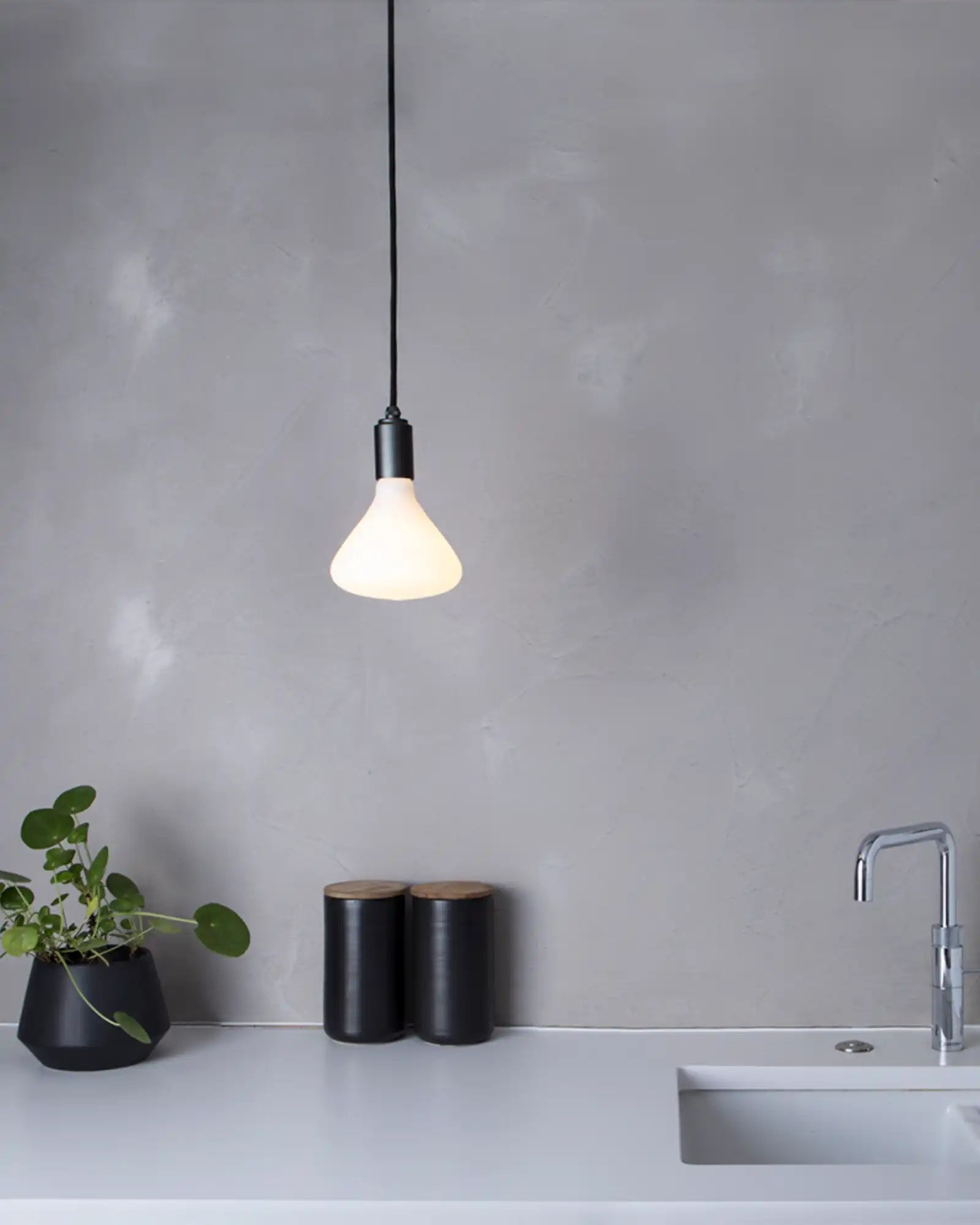 Noma Pendant Light by Tala featured within a minimalist kitchen | Nook Collections