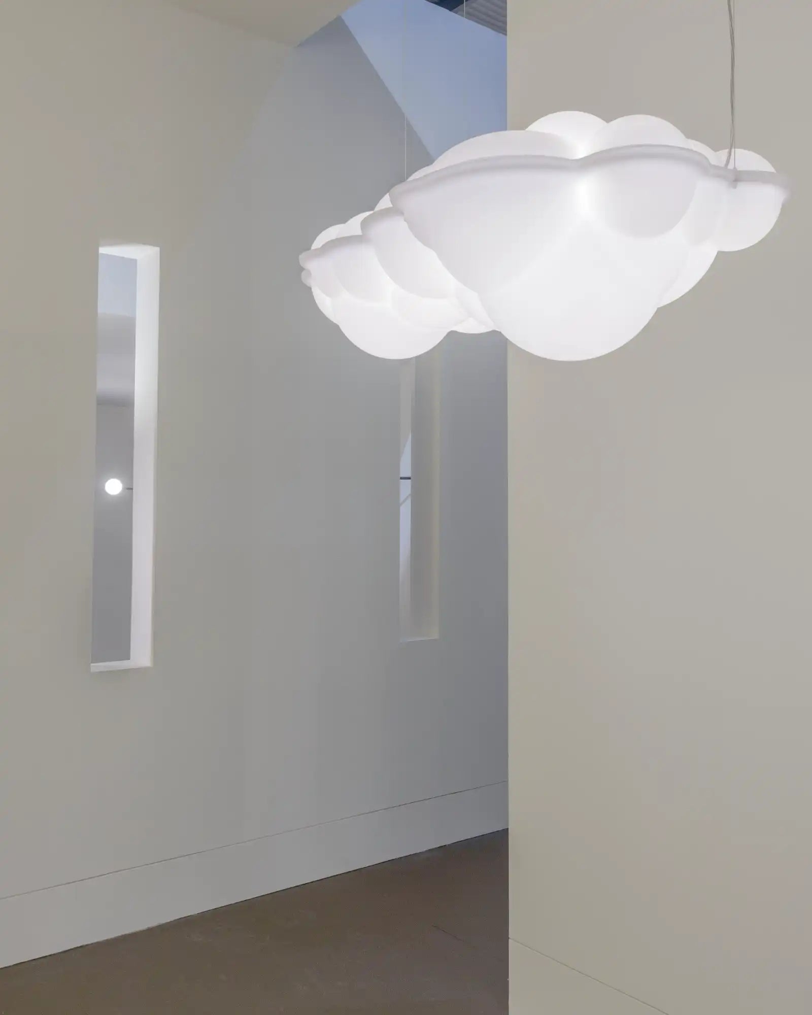 Nuvola Minor Pendant Light by Nemo Lighting featured in a modern contemporary hallway | Nook Collections