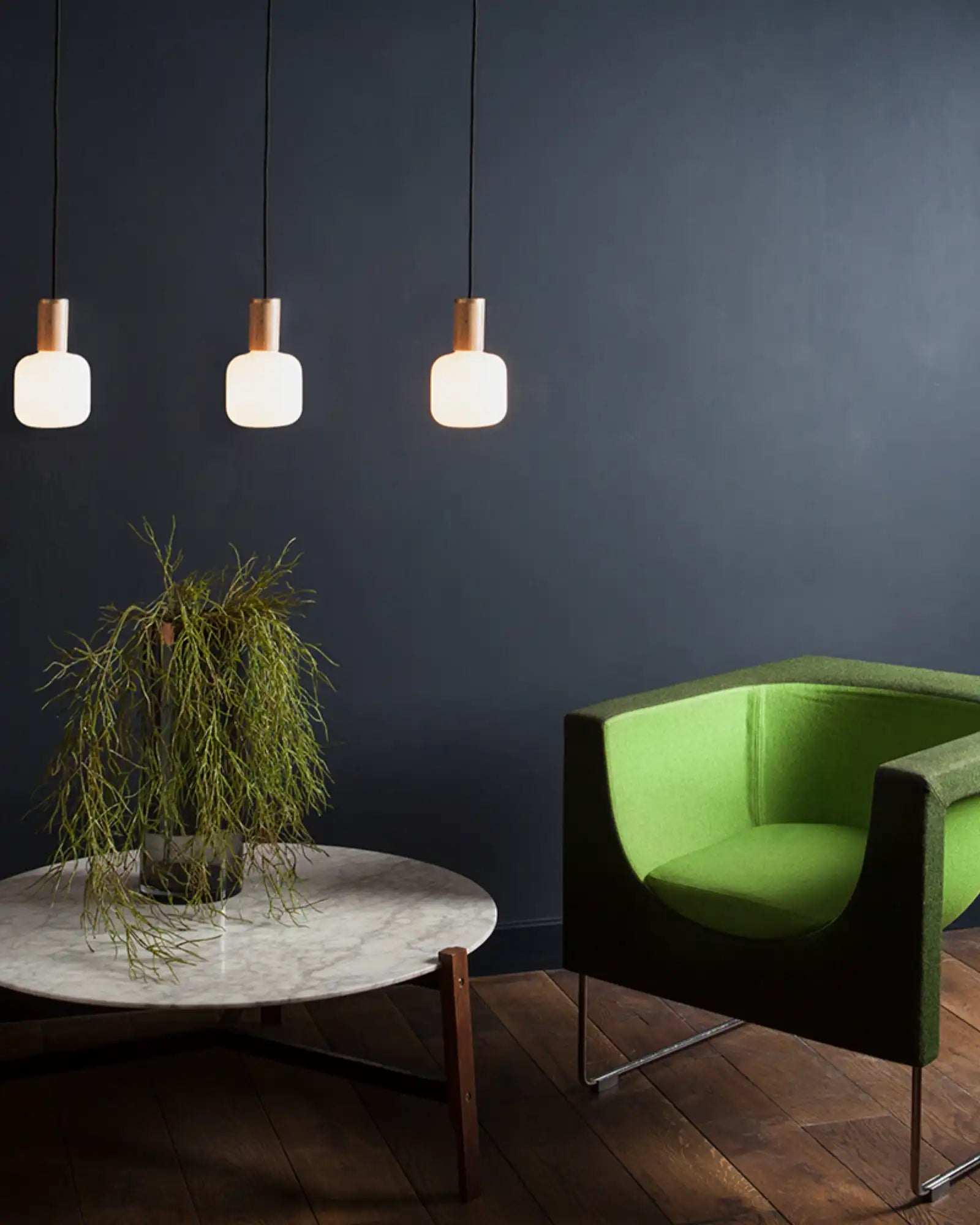 Oblo Pendant Light by Tala featured within a contemporary living room | Nook Collections