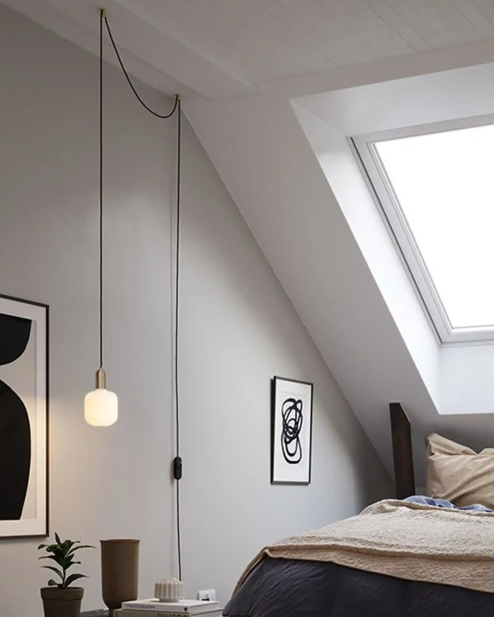 Oblo Plug-in Pendant Light by Tala featured within a contemporary bedroom | Nook Collections