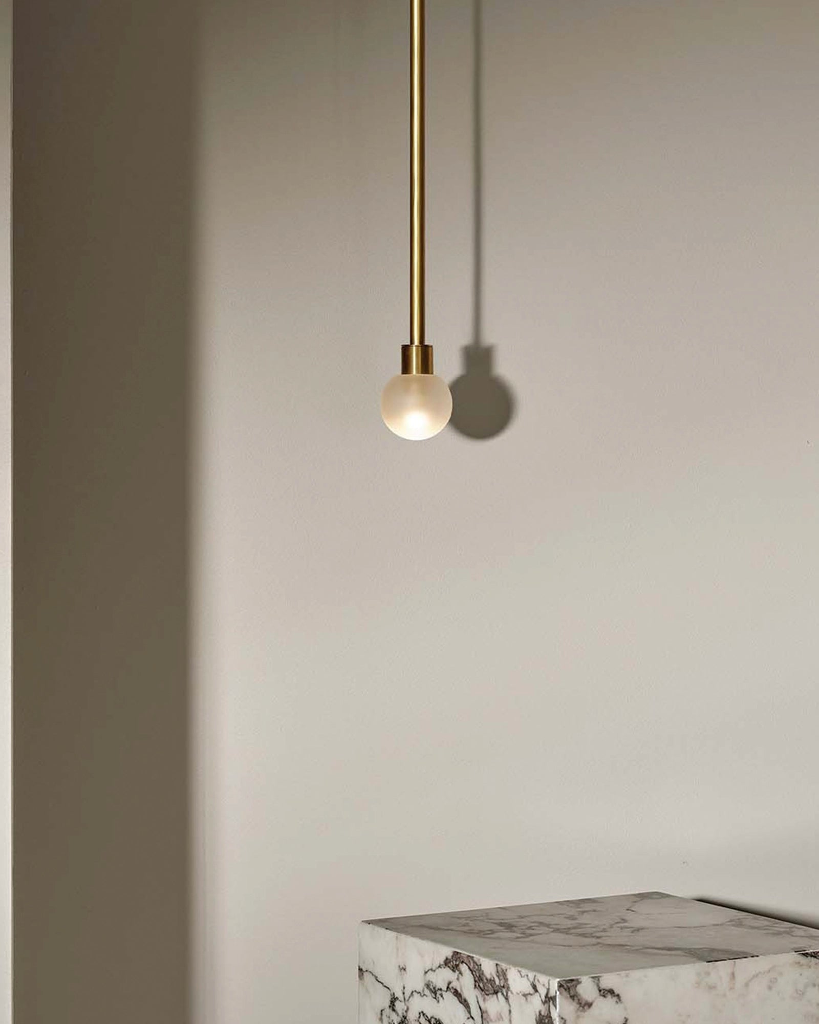 Brass orb shop pendant light