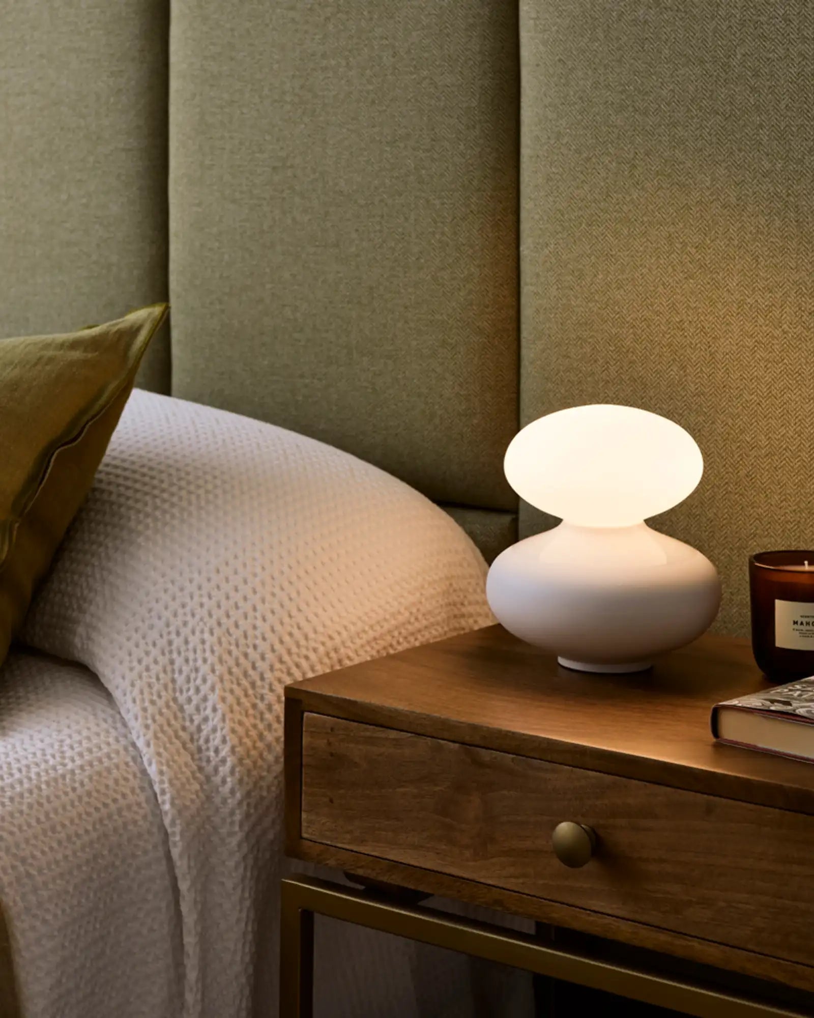 Oval Reflection Table Lamp by Tala featured within a contemporary bedroom | Nook Collections