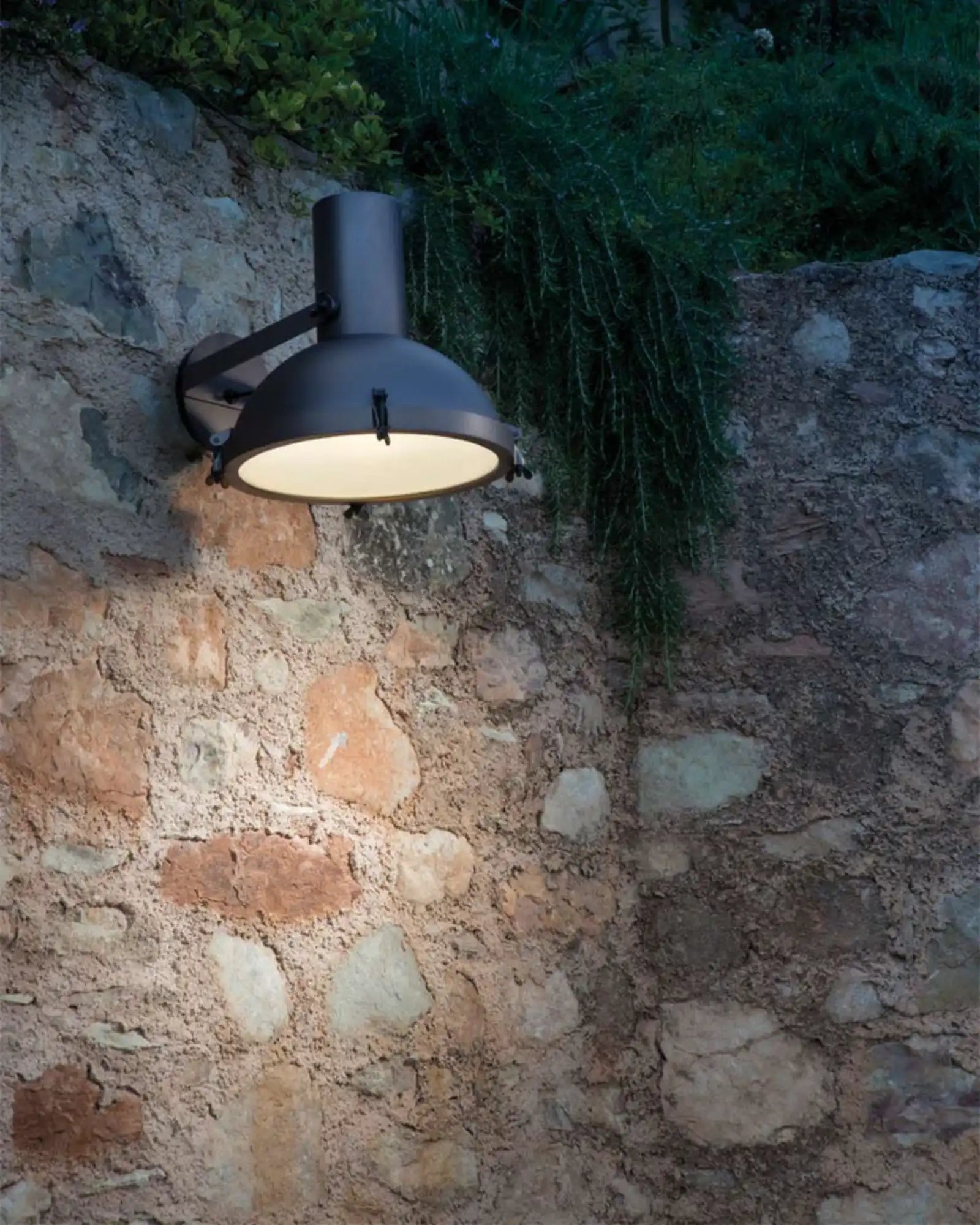 Projecteur Wall Light by Nemo Lighting featured in a garden | Nook Collections