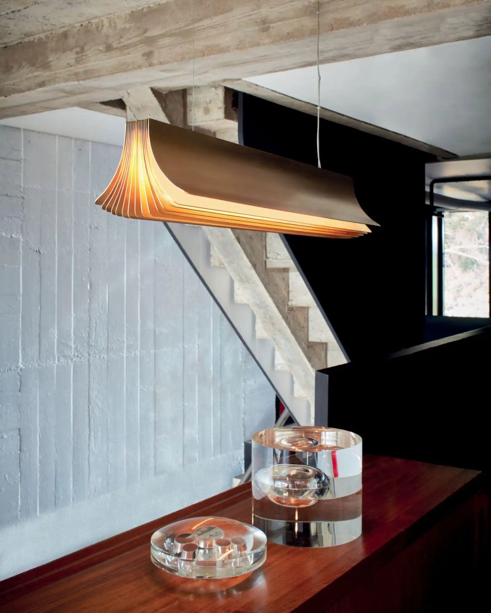 Respiro Pendant Light by DCW Editions featured within a contemporary dining room | Nook Collections