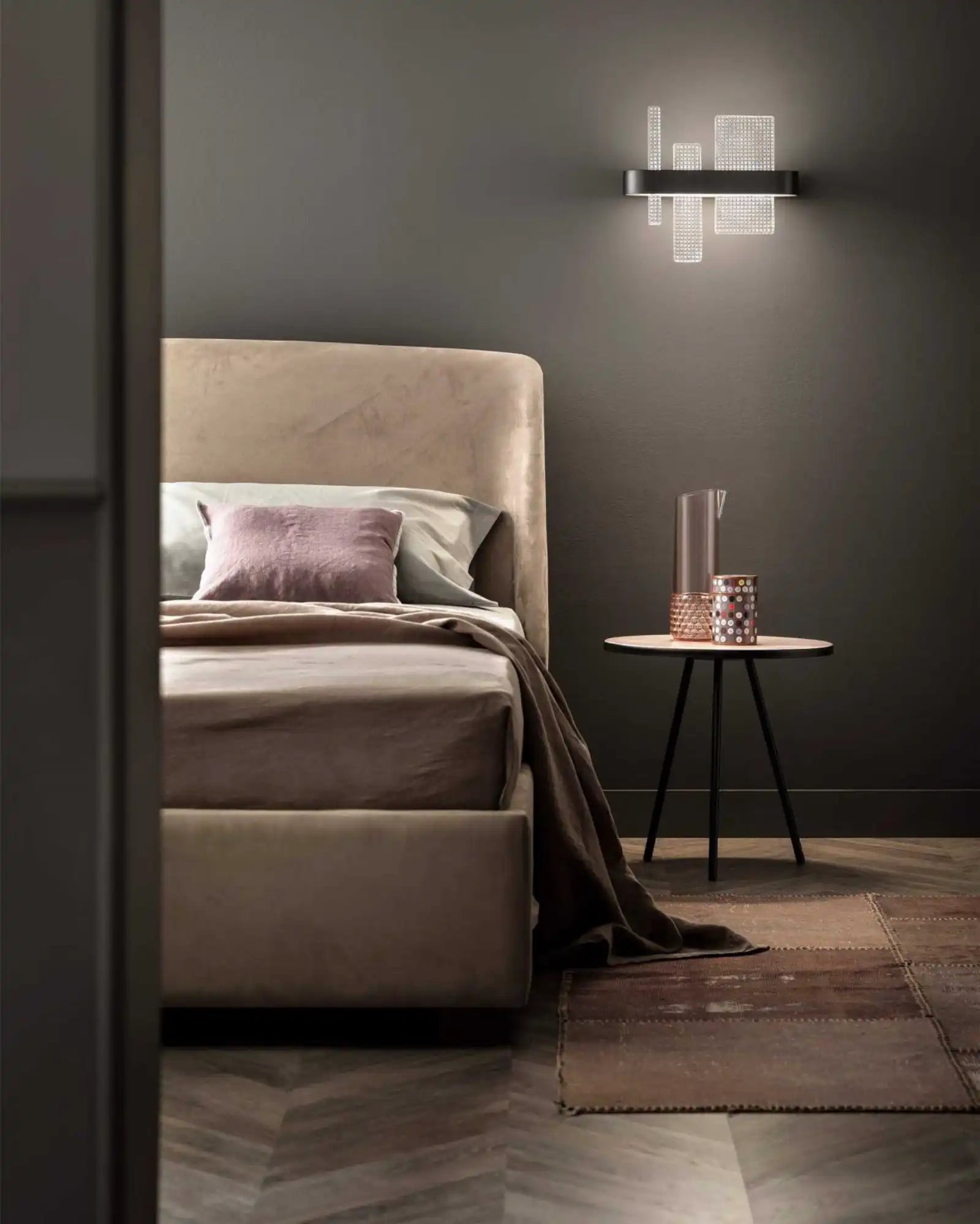 Ribbon Wall Light by Masiero Lighting featured within a modern bedroom | Nook Collections