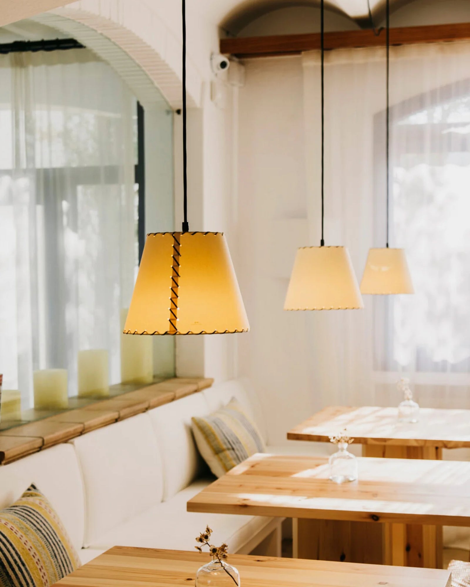 Sisisi Conicas Pendant Light by Santa & Cole featured in a modern contemporary dining room | Nook Collections