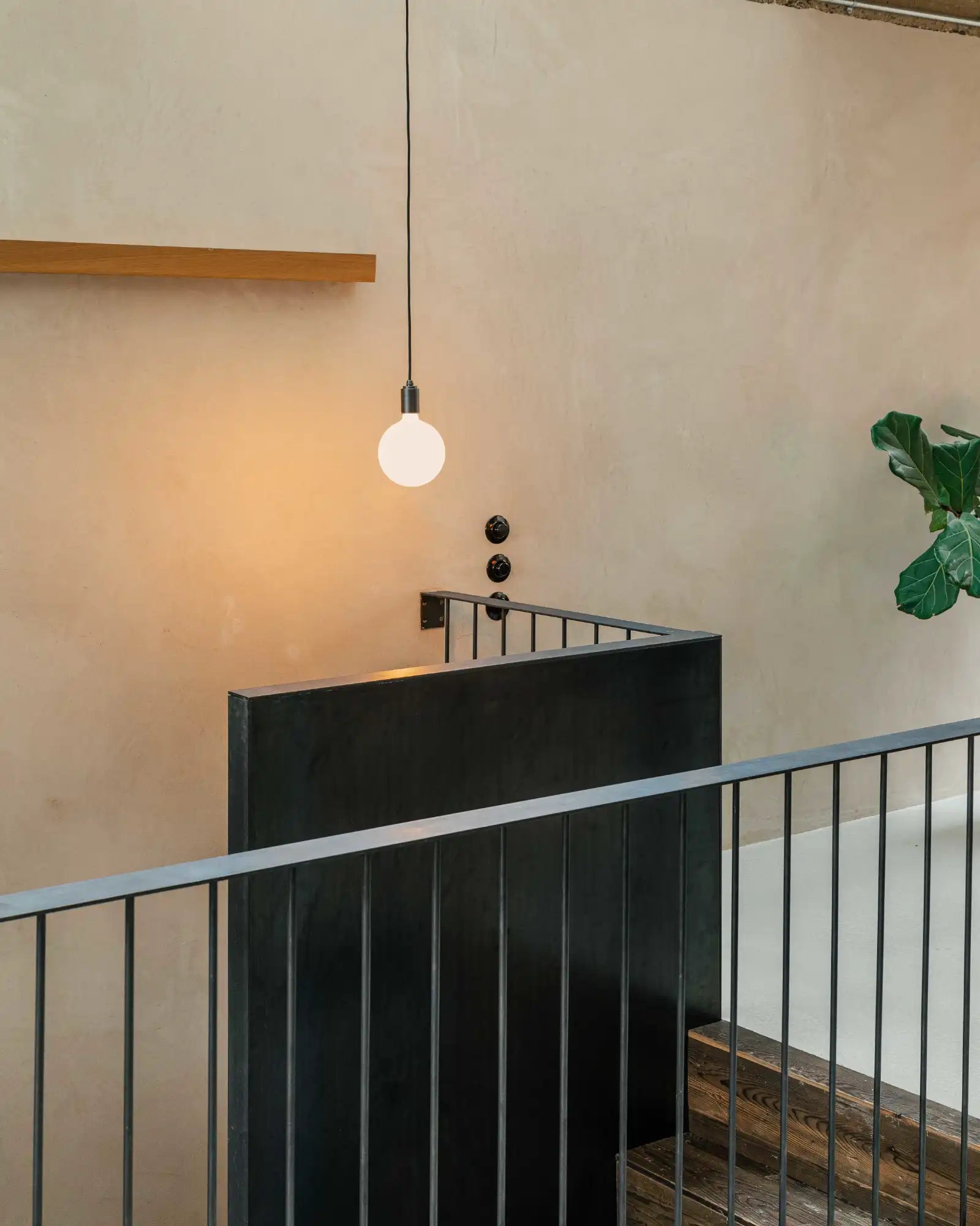 Sphere IV Pendant Light by Tala featured in a contemporary stairway | Nook Collections