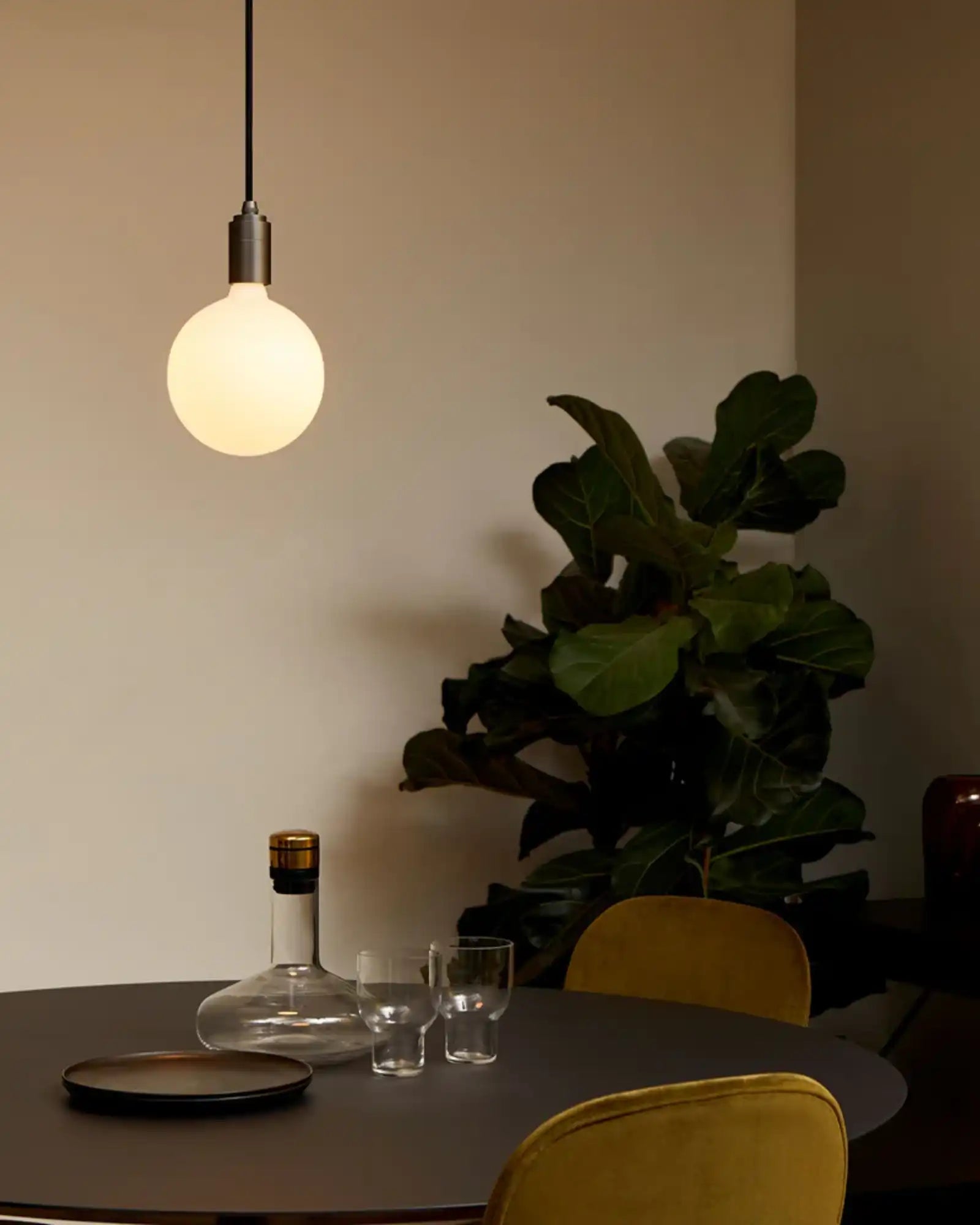 Sphere IV Pendant Light by Tala featured within a contemporary dining room | Nook Collections