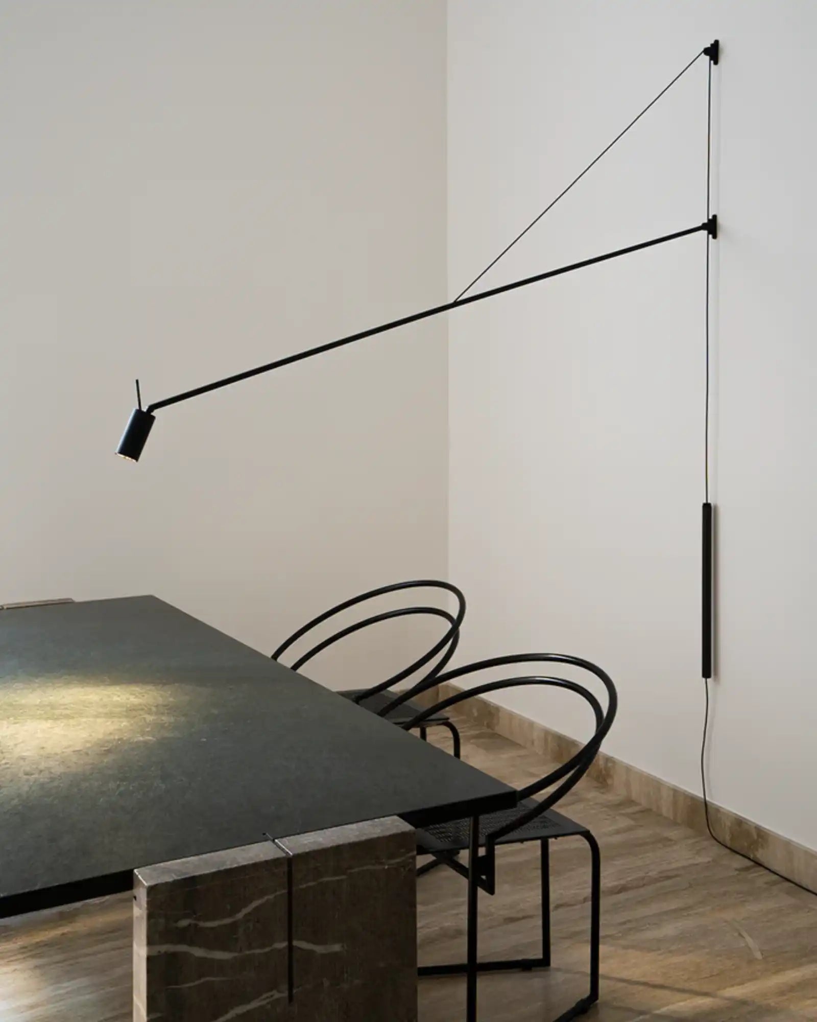 Swan Wall Light by Nemo Lighting featured in a modern contemporary dining room | Nook Collections