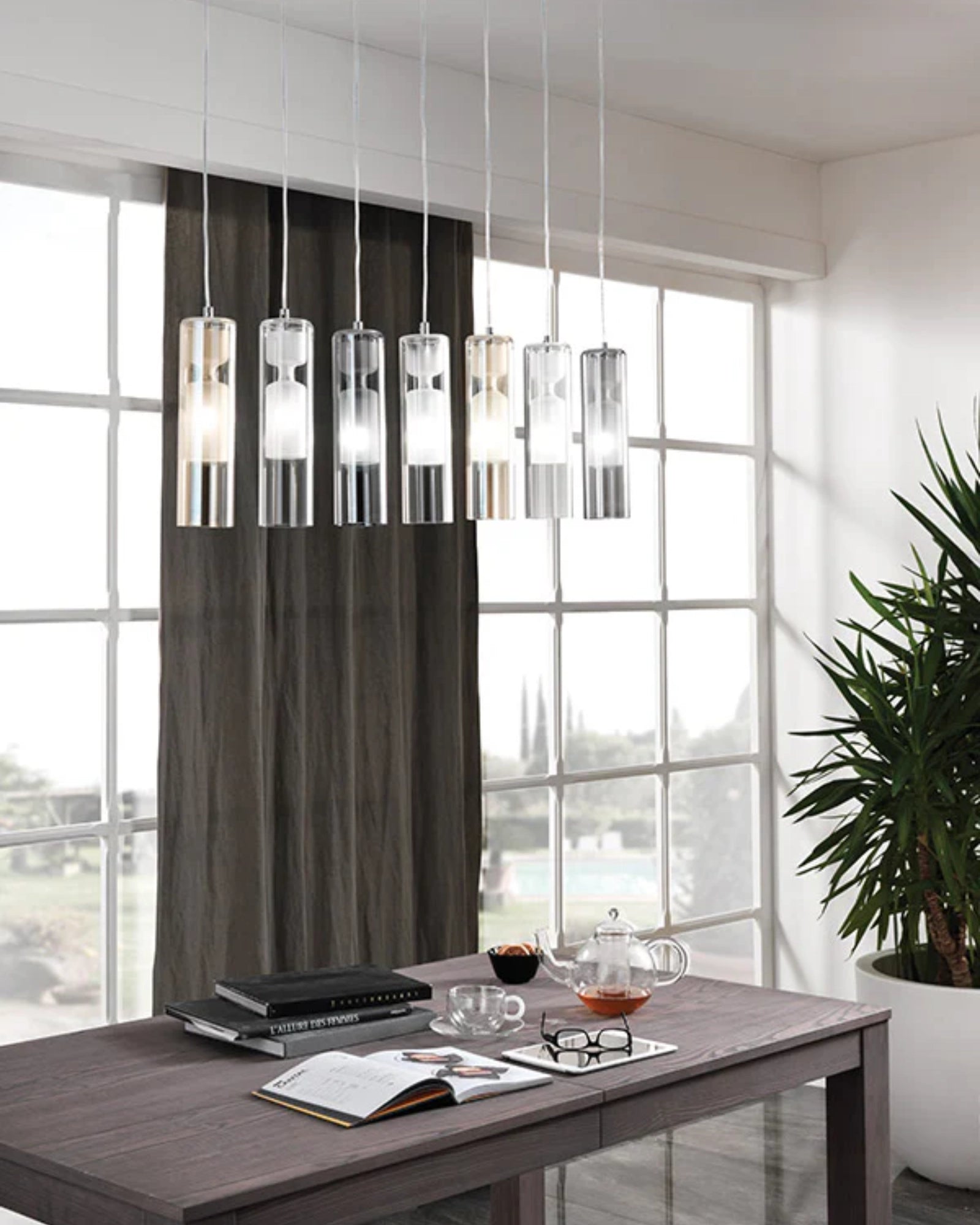 Tao Single Pendant Light by Cangini & Tucci featured in a modern contemporary dining room | Nook Collections