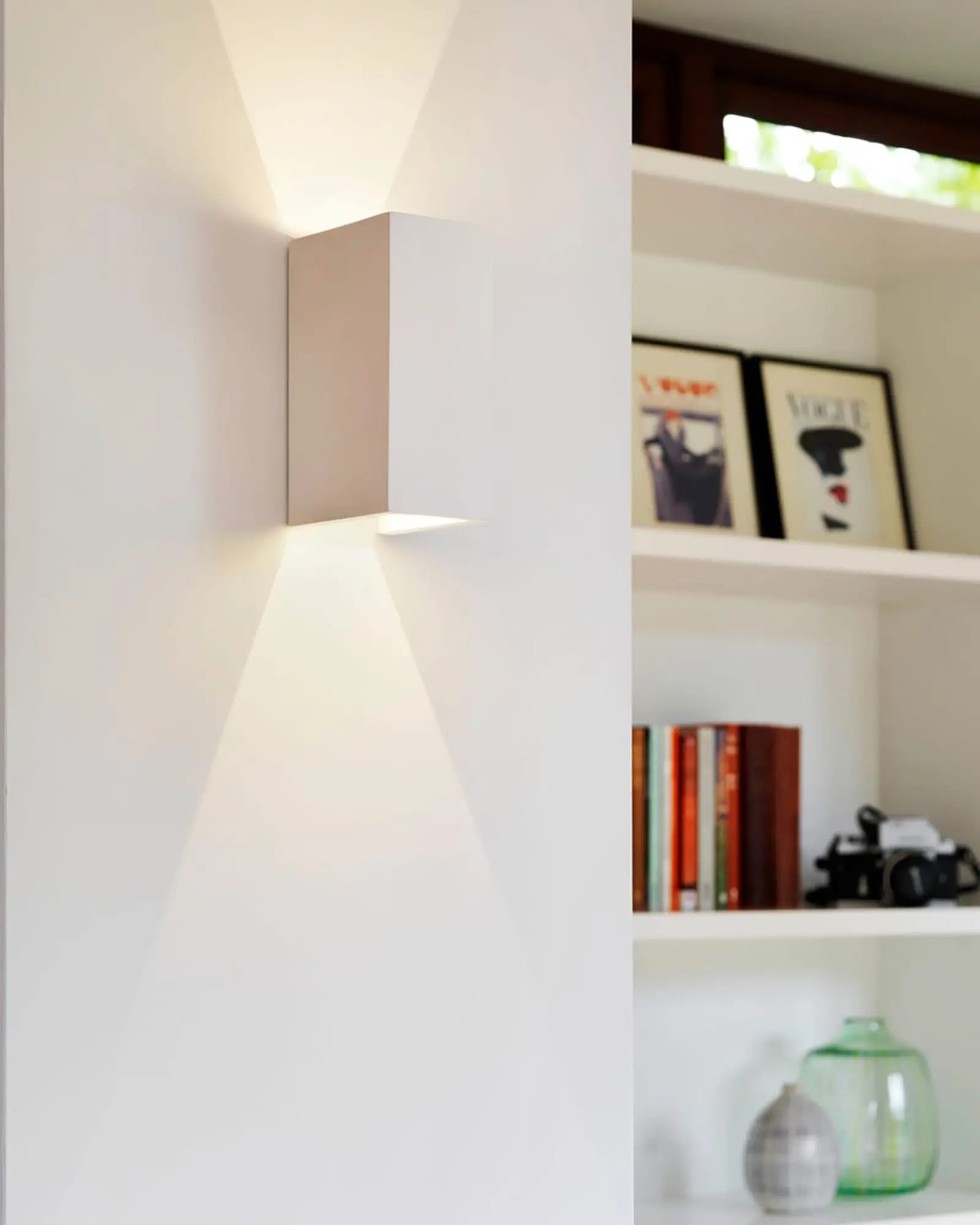 Parma 210 minimalistic plaster rectangular wall light lounge area beside a book shelf
