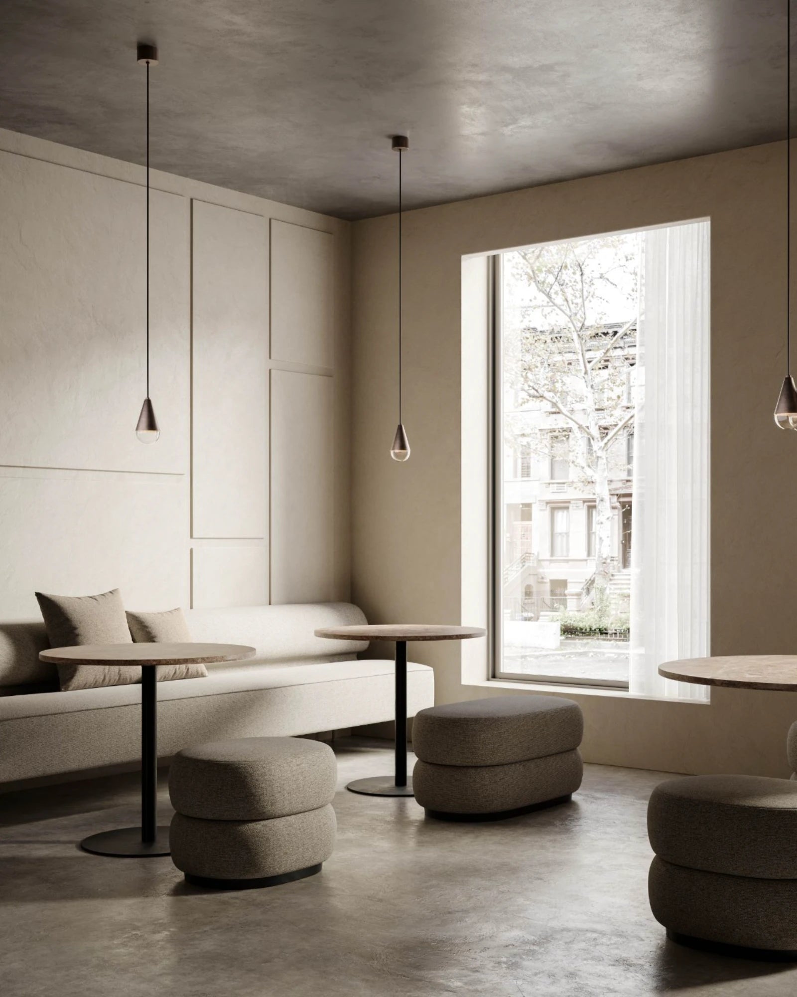 Modern living room with neutral tones, furniture, large window featuring the dew pendant light by il fanale.