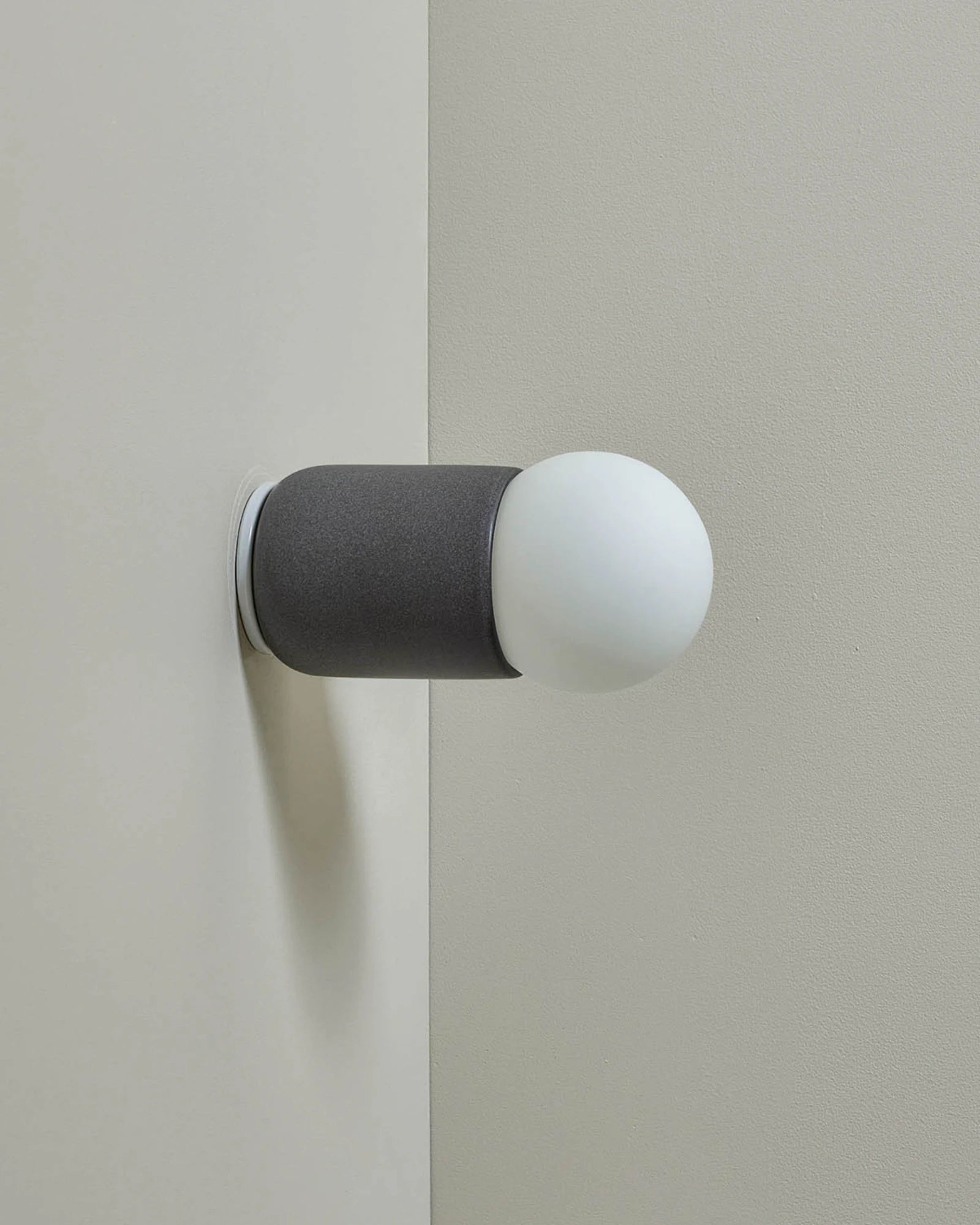 Terra 1 Wall Light in Lead ceramic with white satin finish. -Nook Collections