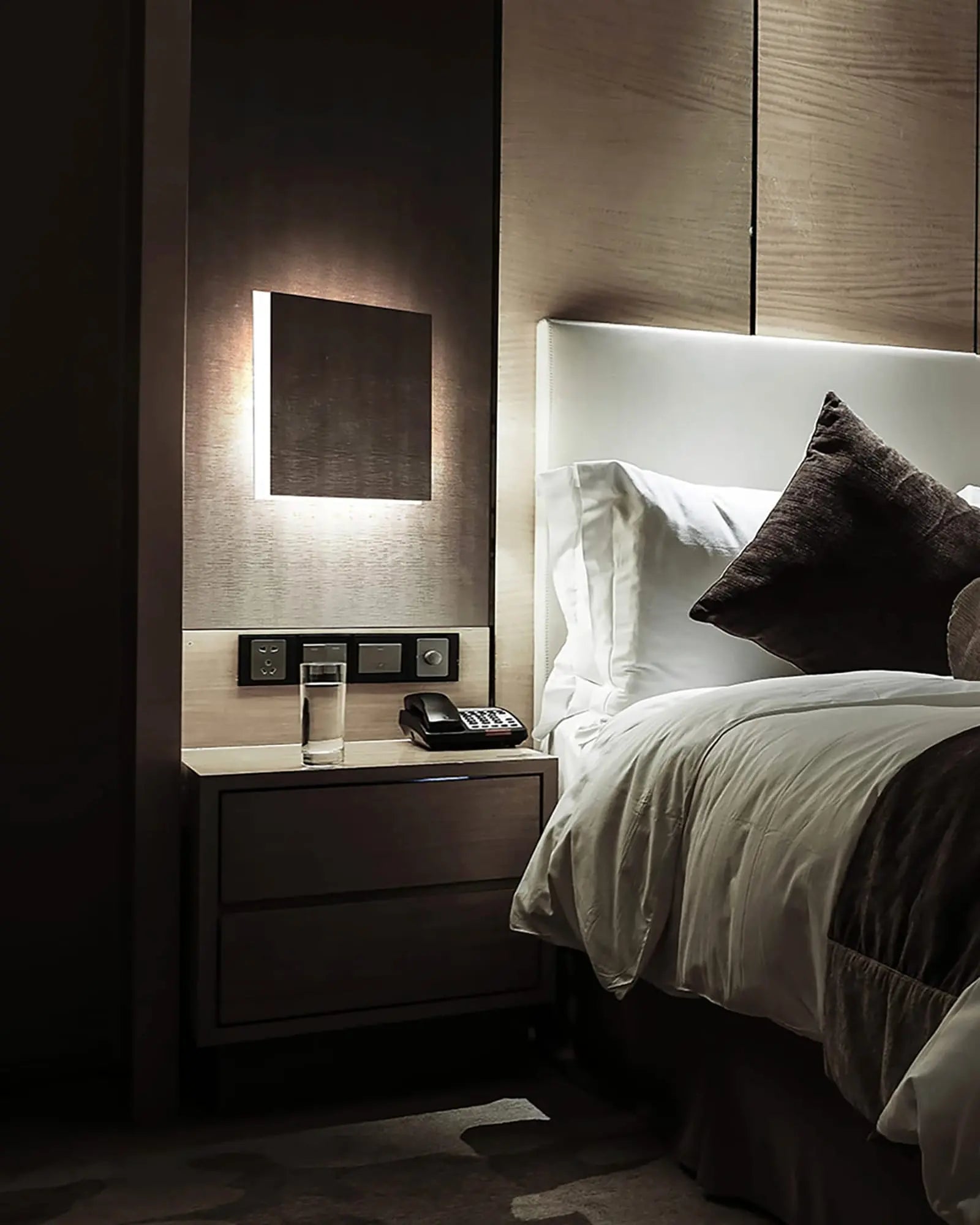 Aldecimo made in Italy square flat wall light in a hotel room bedside