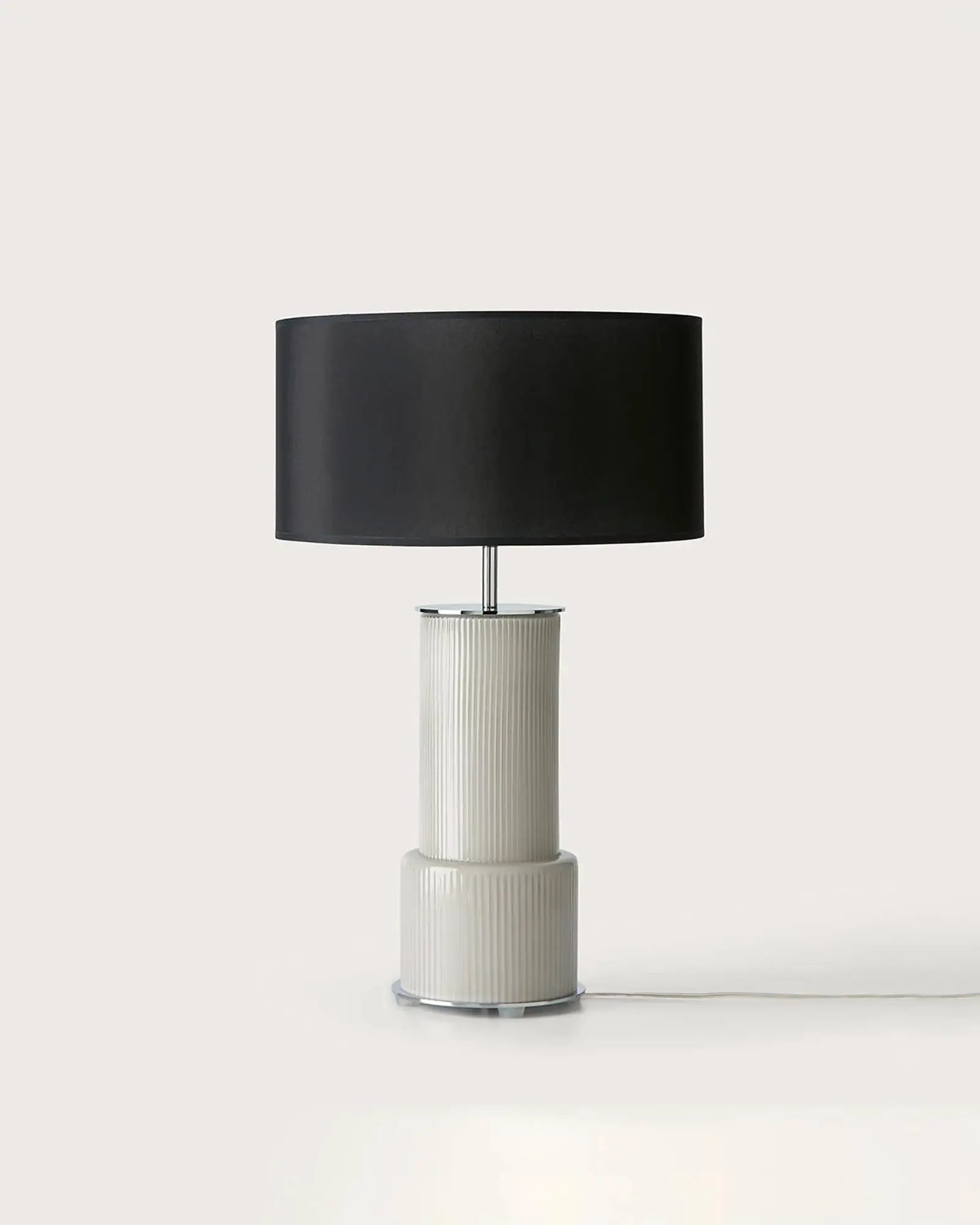 Atina contemporary ceramic and black fabric shade table lamp product photo