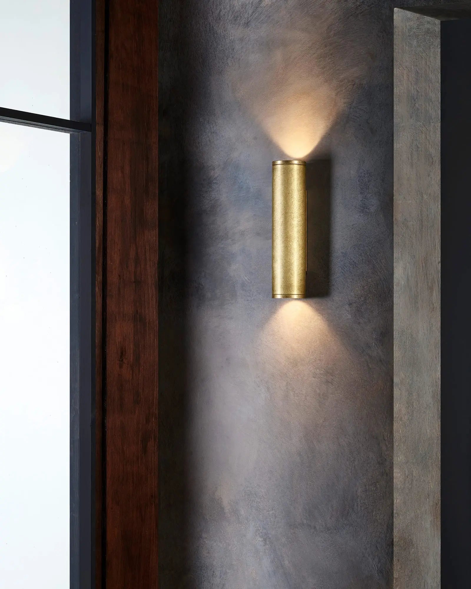 Aba minimalistic cylinder outdoor wall light near entry door