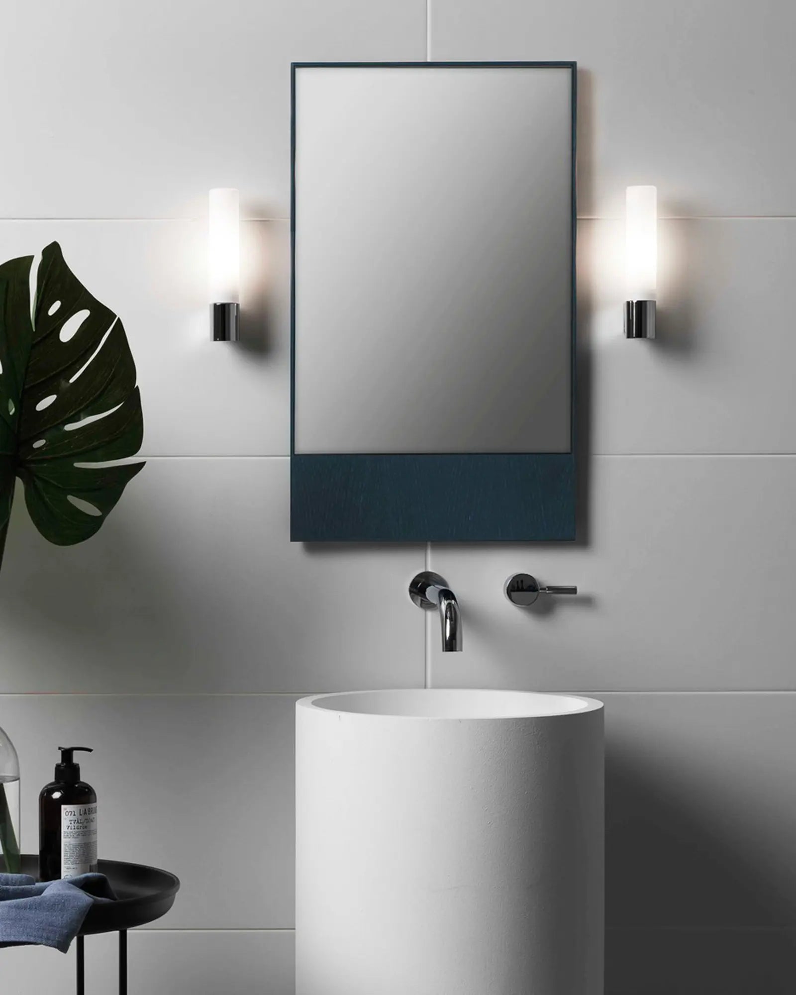 Bari contemporary lantern style bathroom wall lamp on the mirror sides