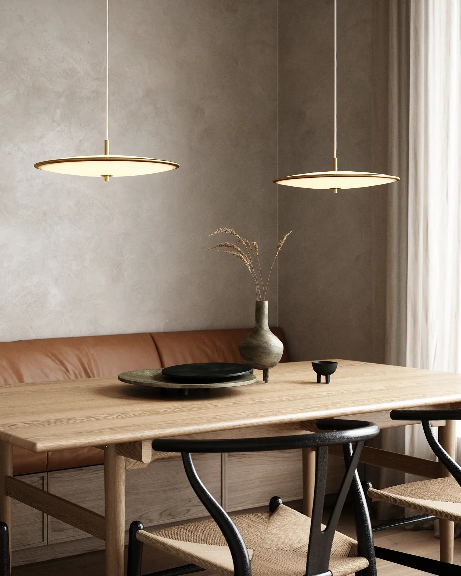 Blanche pendant light cluster over a dining table